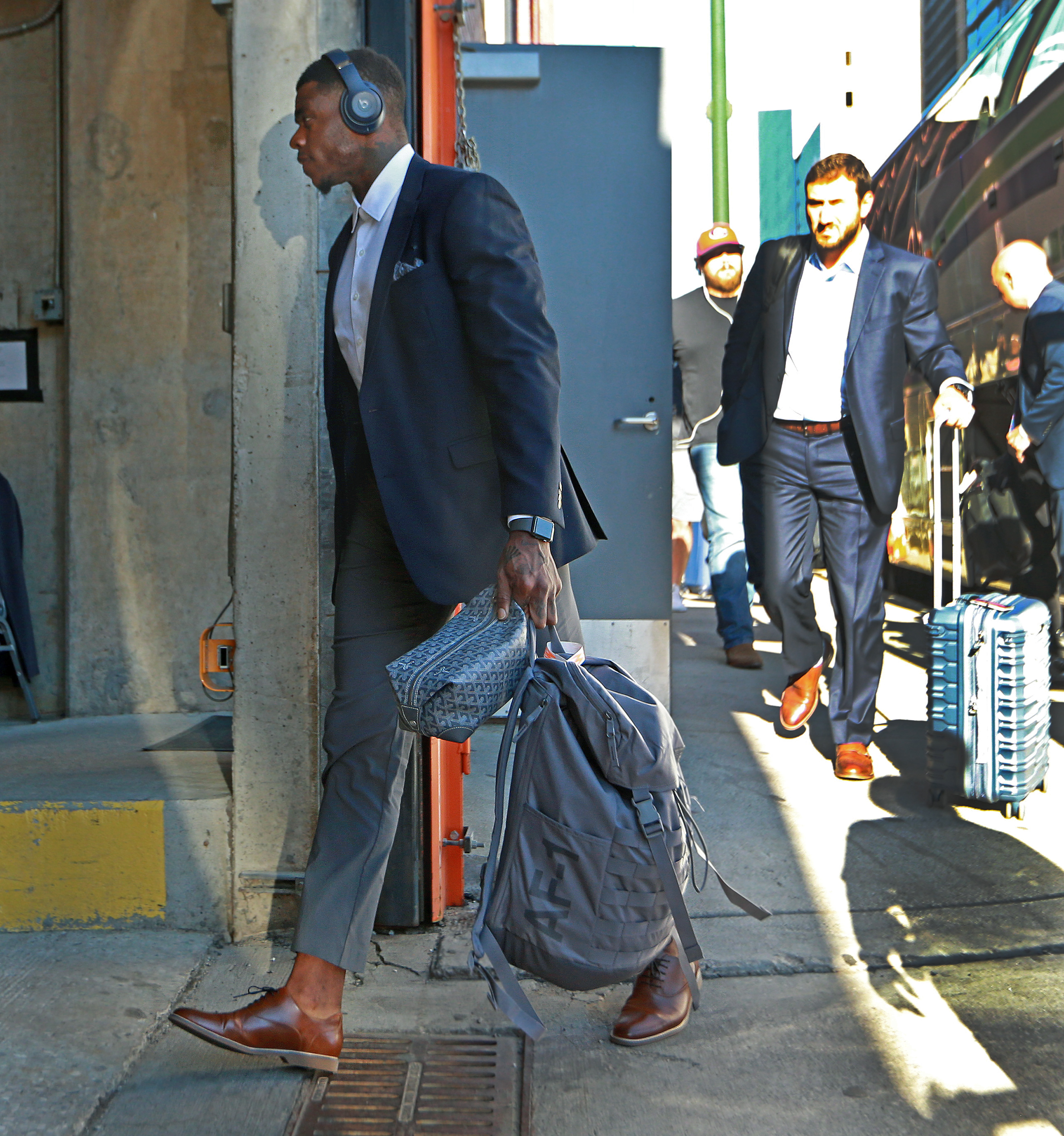 Wide reciever Josh Gordon is pictured as he gets off the team bus and heads into the stadium with his teammates.