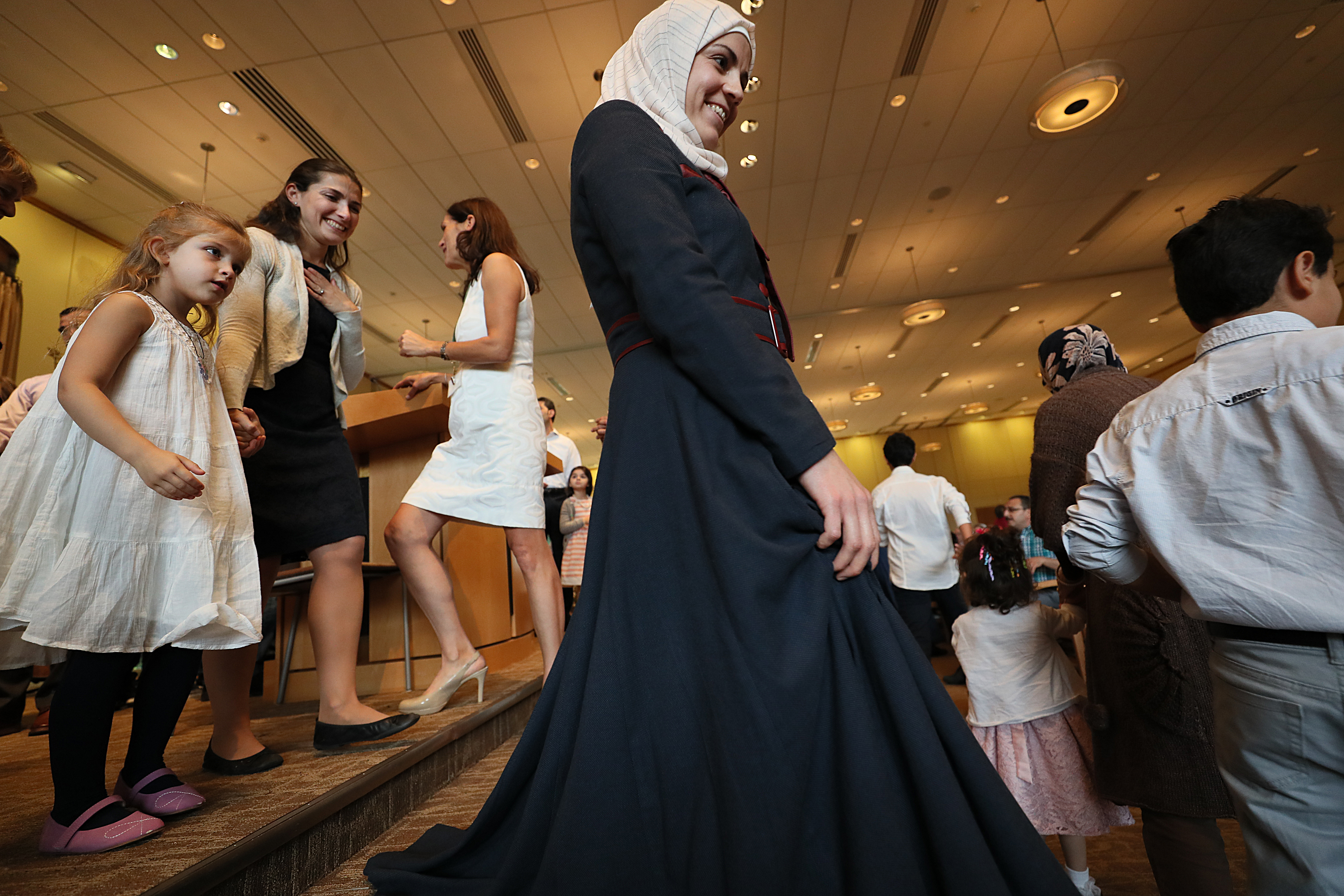 Asmaa smiled as she walked down from the bimah at Temple Beth Elohim on Yom Kippur, surrounded by her Jewish friends.