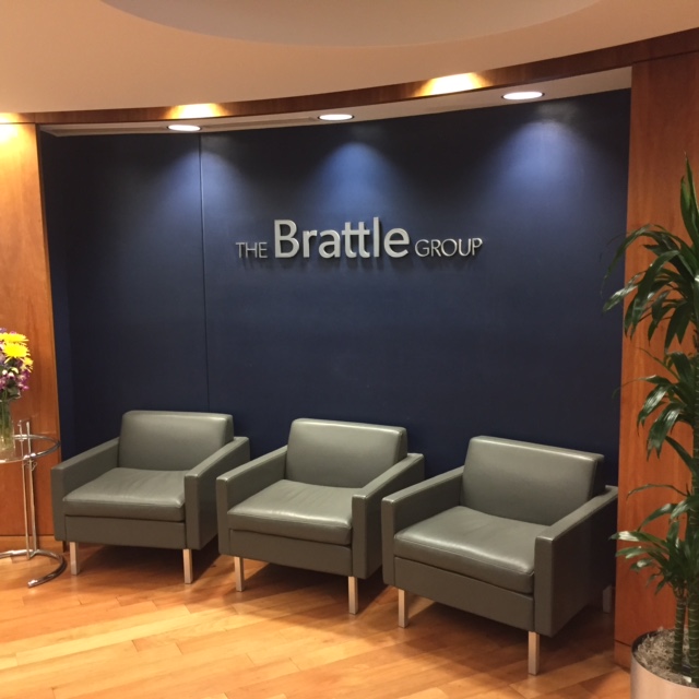 The Cambridge research firm’s lobby, in a Brattle Street building shared with a sports store. The firm’s approach is data-driven.