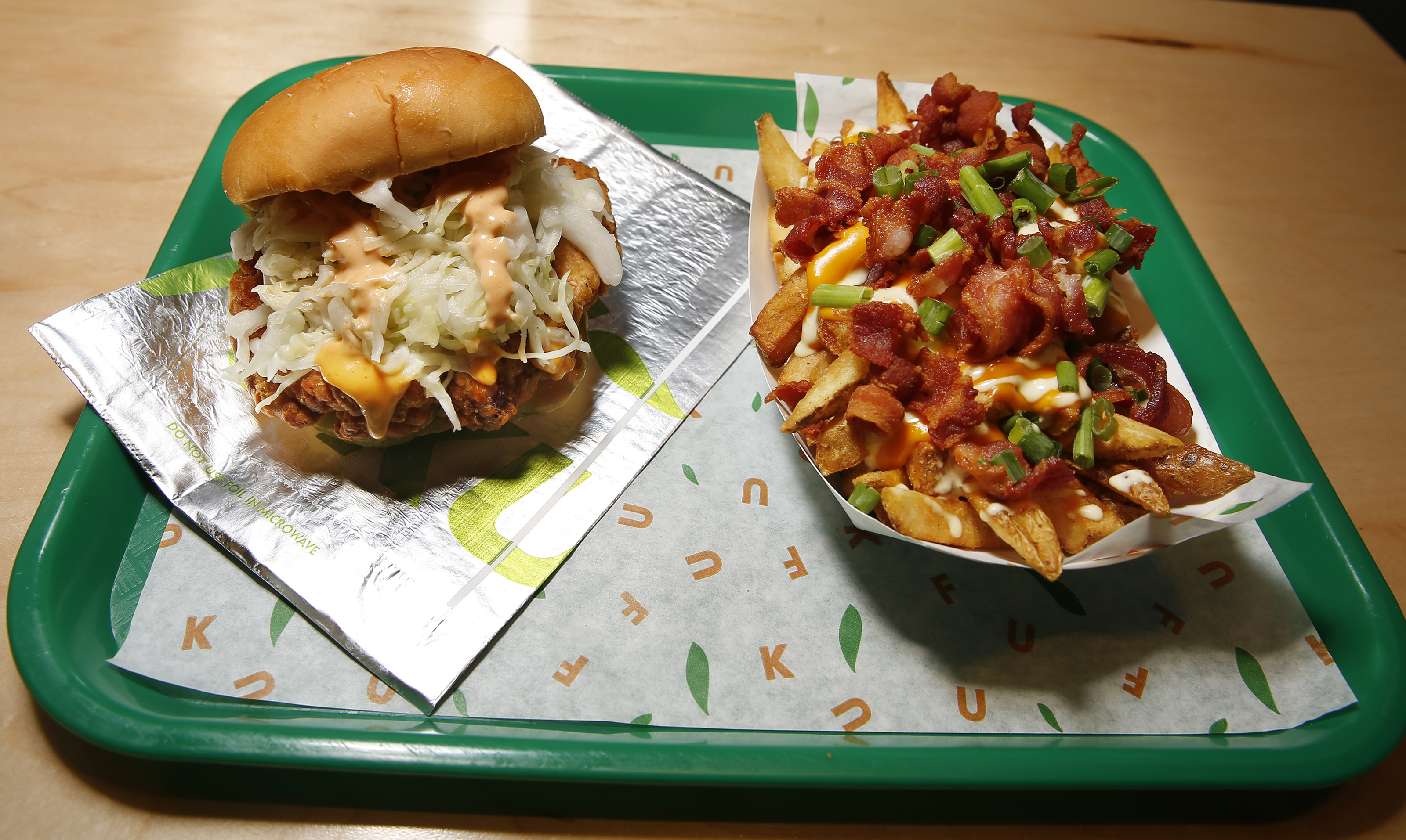 The Loaded Fries and Knockout Sandwich at Fuku.