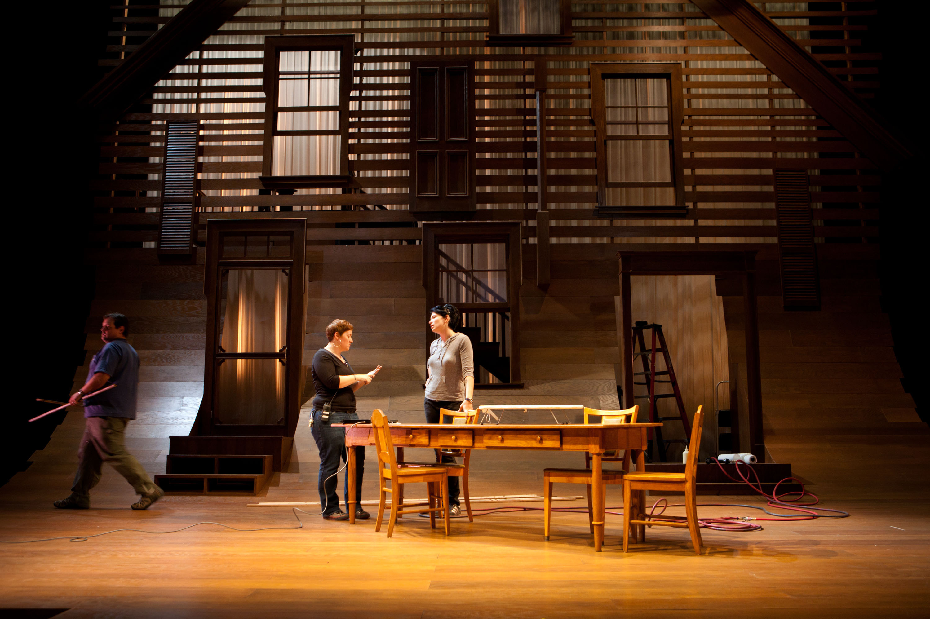 Adam Godbout, Mercedes Roman-Manson, and Kat Herzig working on the set of “The Luck of the Irish’’ at the Calderwood Pavilion, Boston Center for the Arts.