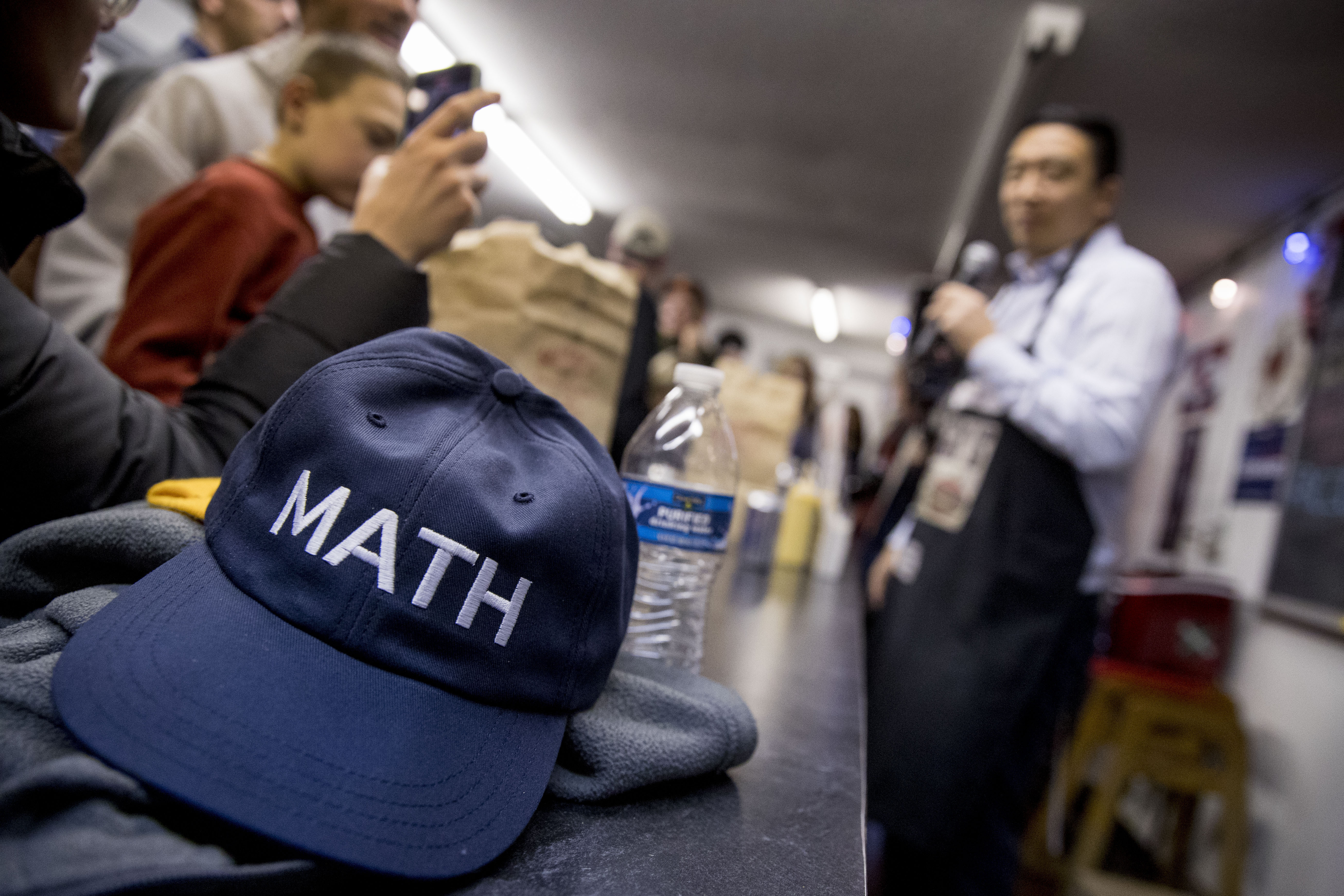 A hat with the word "math" sat on the counter as Democratic presidential candidate Andrew Yang spoke at a campaign stop at Shaggy's Gourmet Burgers on Jan. 4 in Wapello, Iowa.