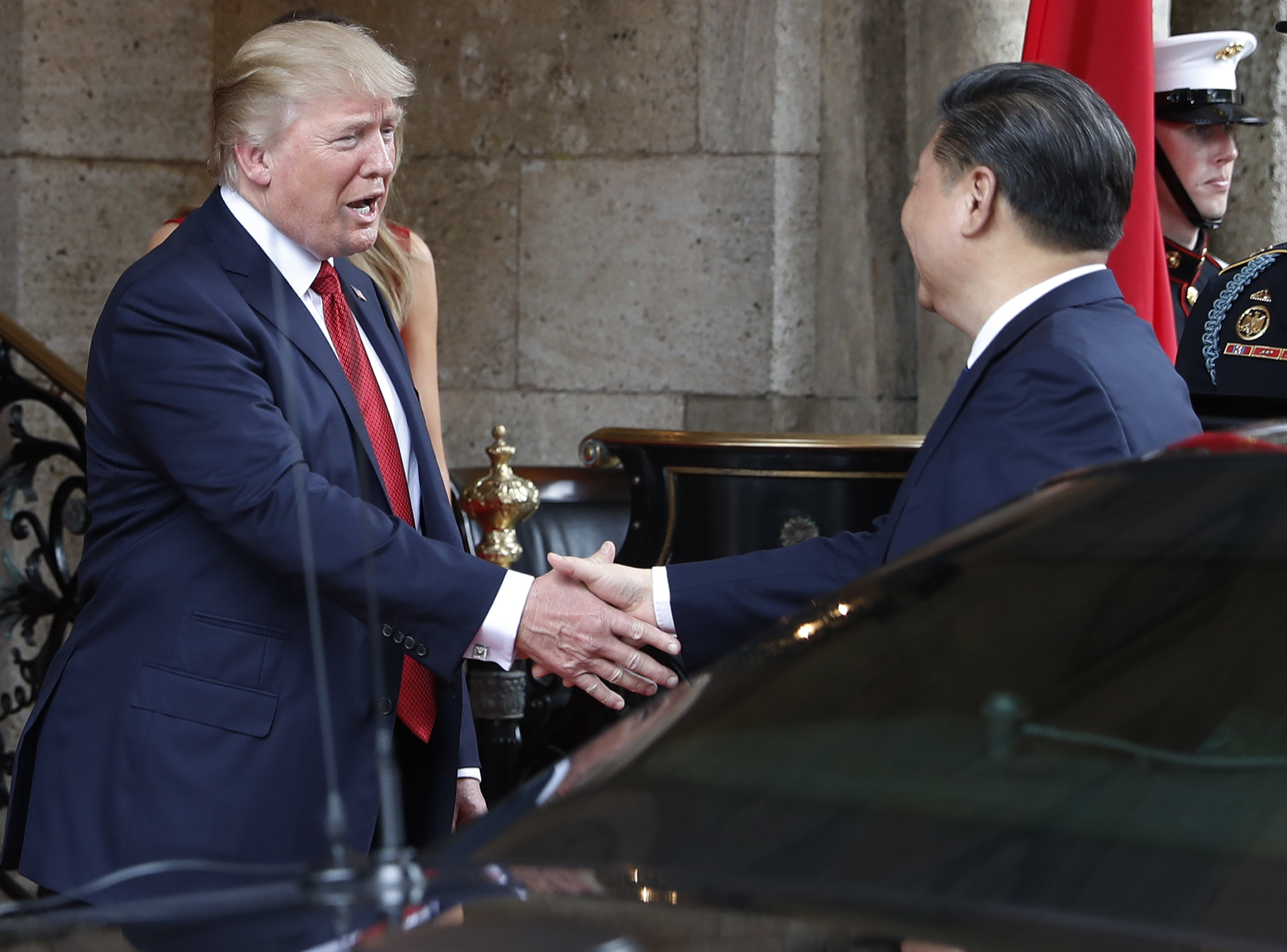 President Donald Trump shook hands with Chinese President Xi Jinping as he arrived before dinner at Mar-a-Lago.