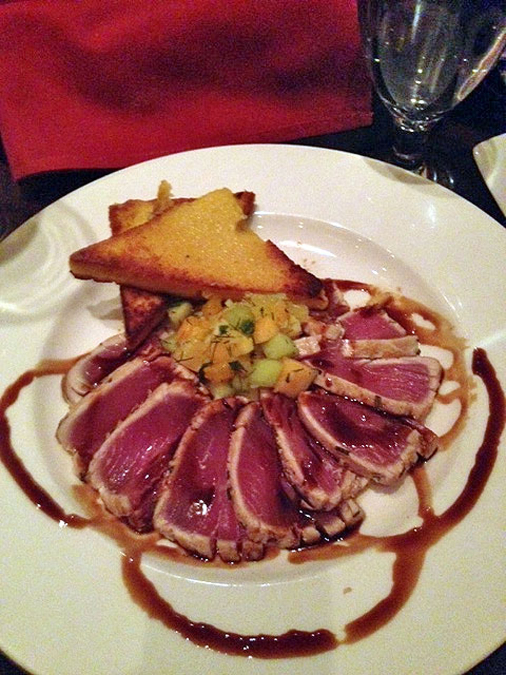 A dish of seared and herb-crusted tuna