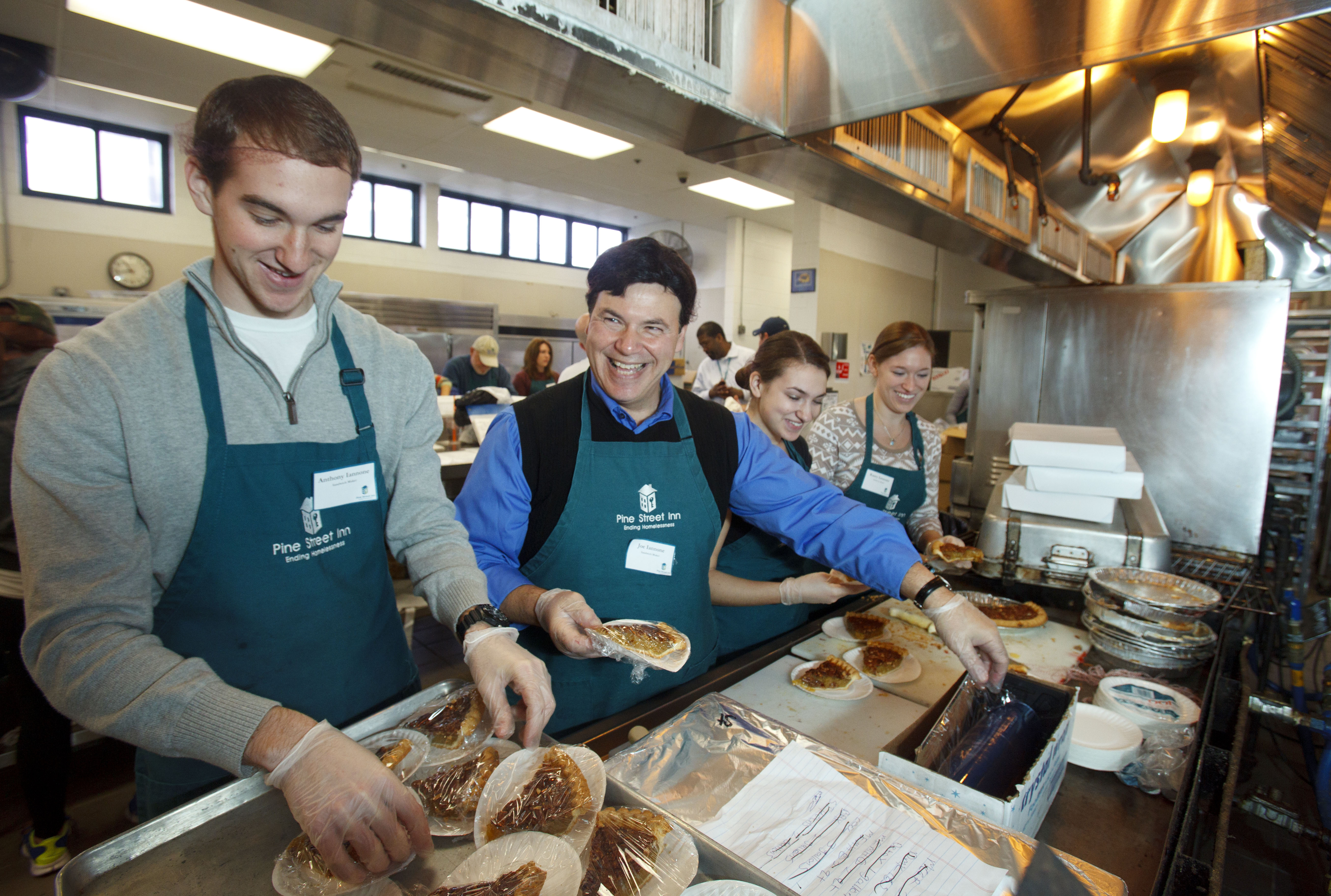 The Iannone family — Anthony (left), Joe, Paulette, and Kasey — were Thanksgiving Day volunteers at the Pine Street Inn.