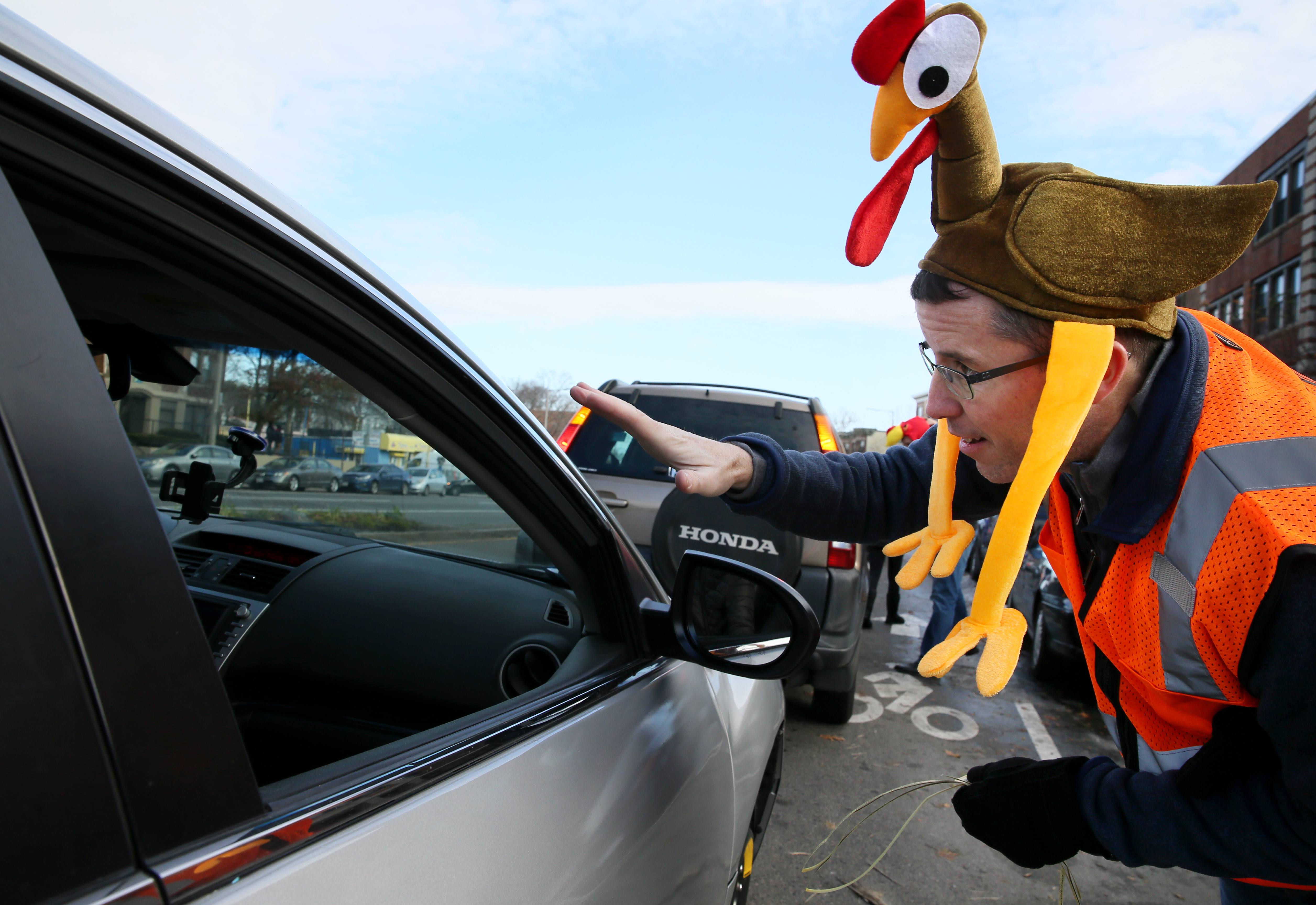 Volunteer E. J. Whelan was dressed for the occasion as he directed traffic.