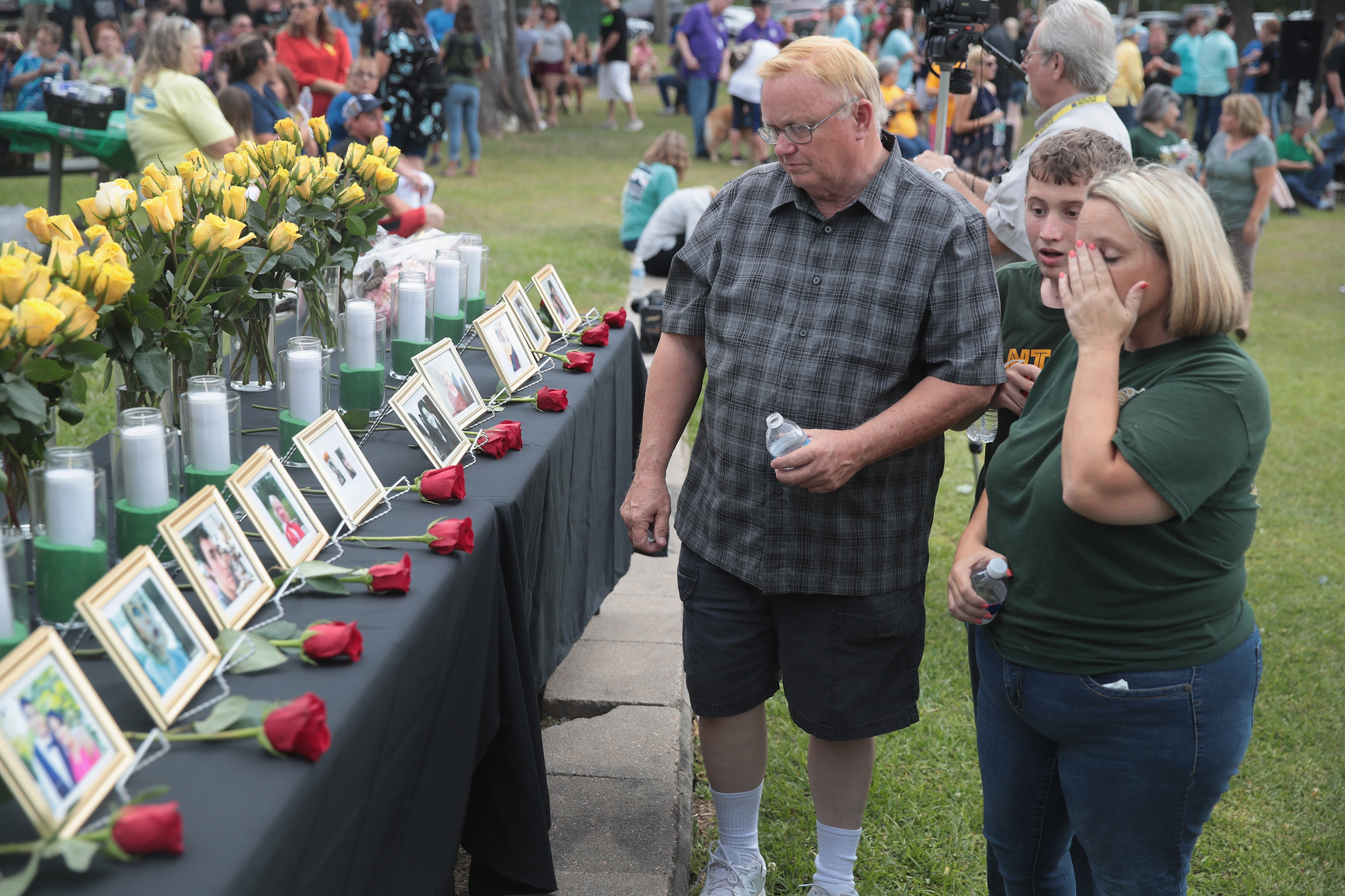 Photos of victims of the Santa Fe High School shooting were displayed at a prayer vigil on Sunday.