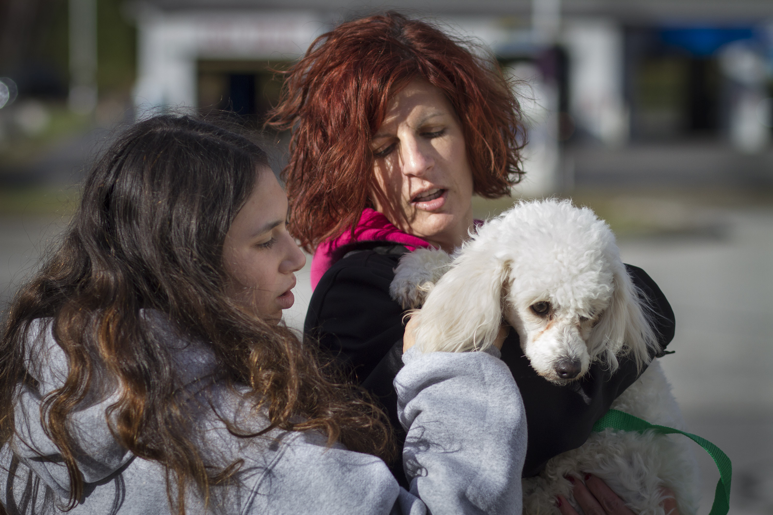 Gavi Azoff and her mom, Nicki, embrace their new pet.