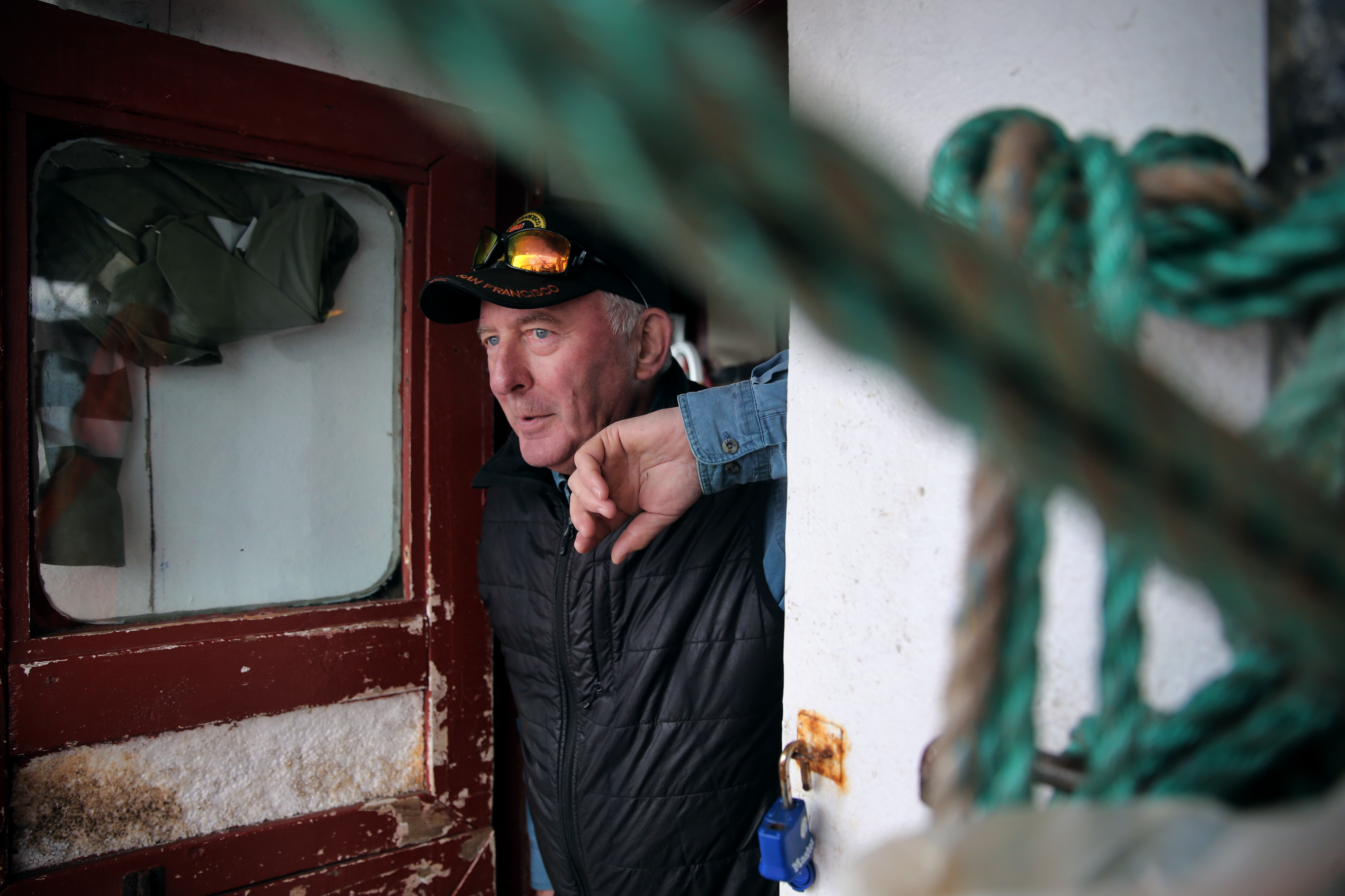 Skipper Tom Best watched over activities on his boat while working with a team of researchers from Canada’s Department of Fisheries and Oceans, who were tagging cod in Motion Bay.