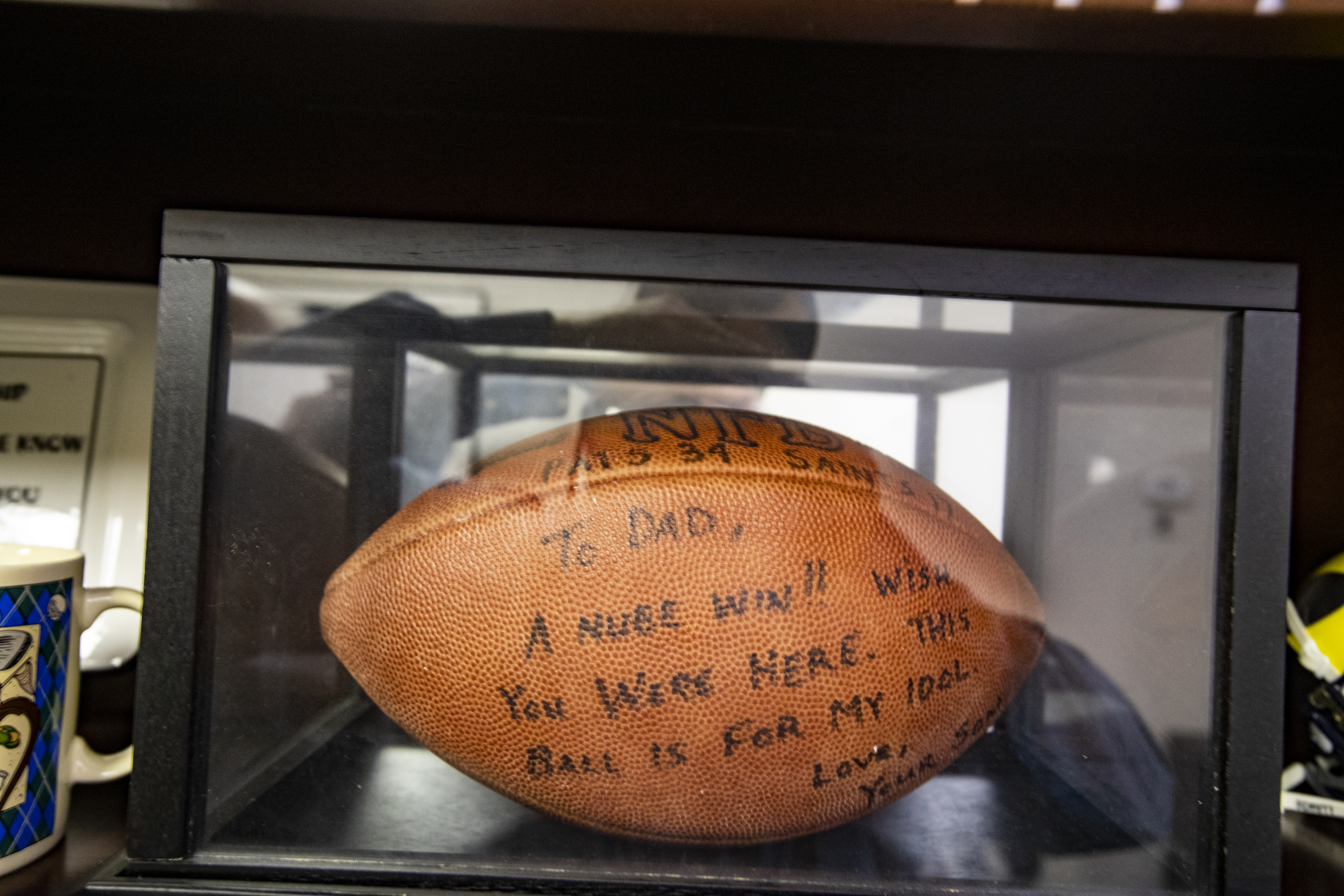 Tom Brady signed this football for his father, the first game Brady played over a healthy Drew Bledsoe.