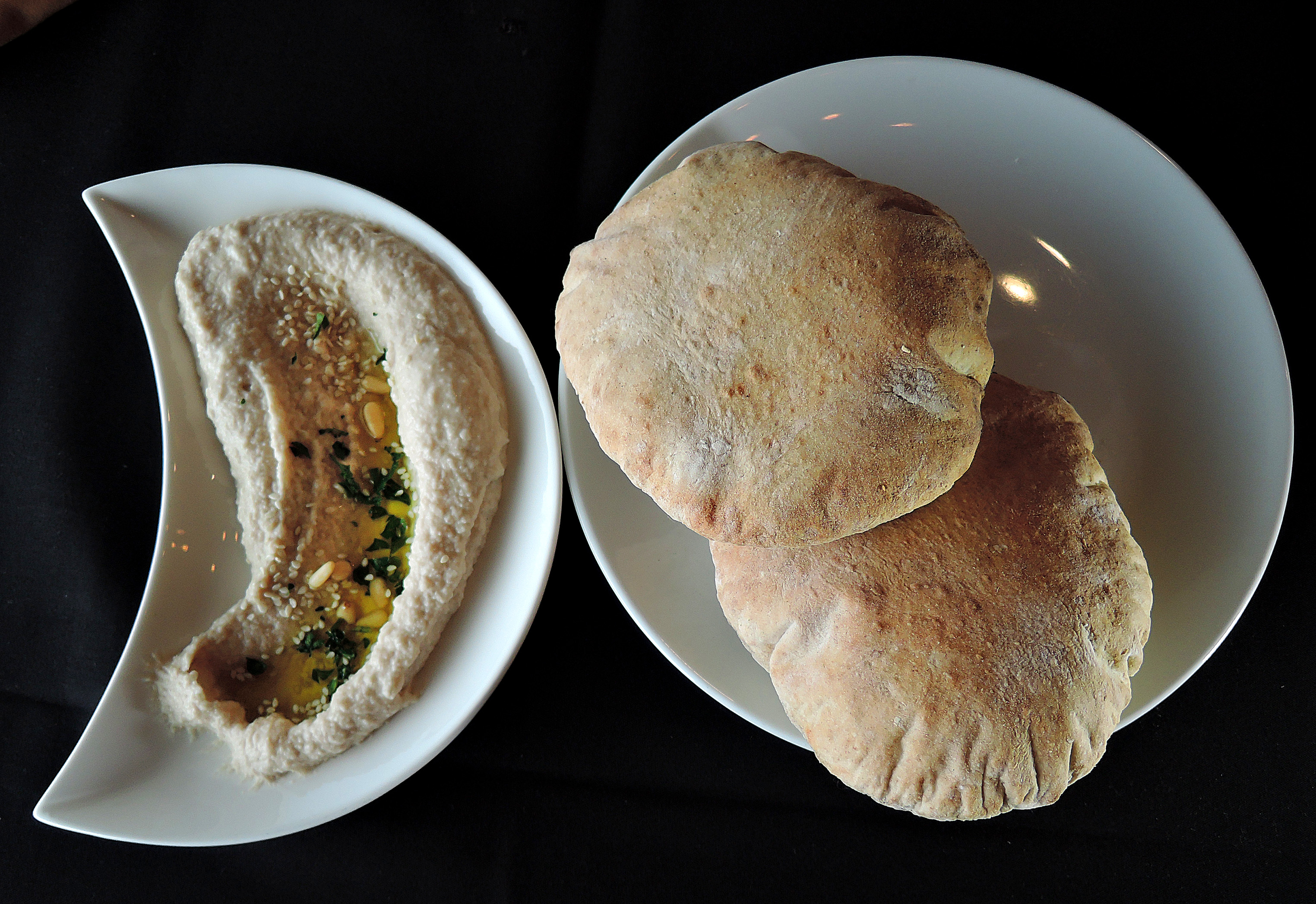 Hummus and pita at Simcha, a modern Israeli restaurant in Sharon.