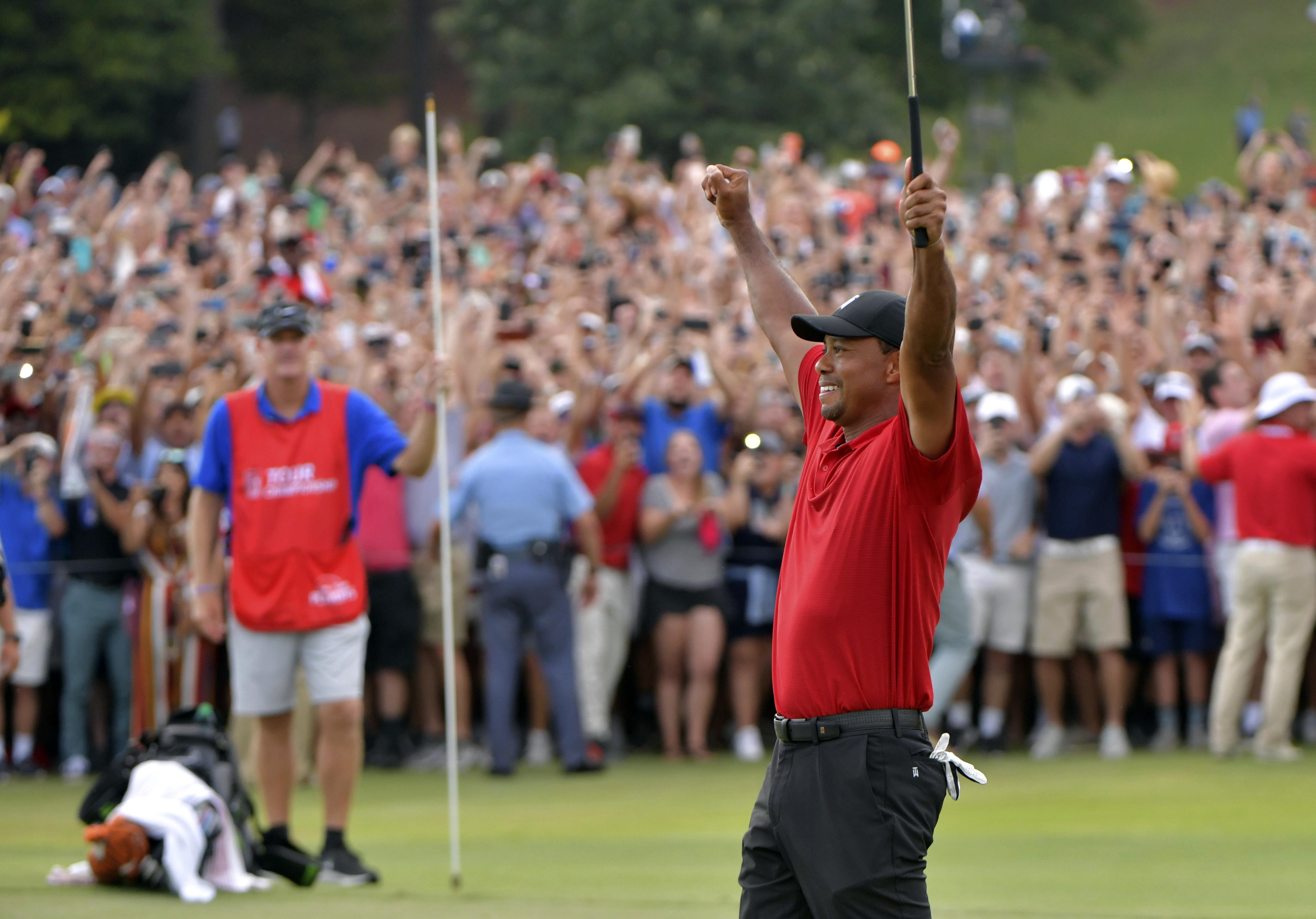 Tiger Woods celebrates after winning the Tour Championship in Atlanta in September.