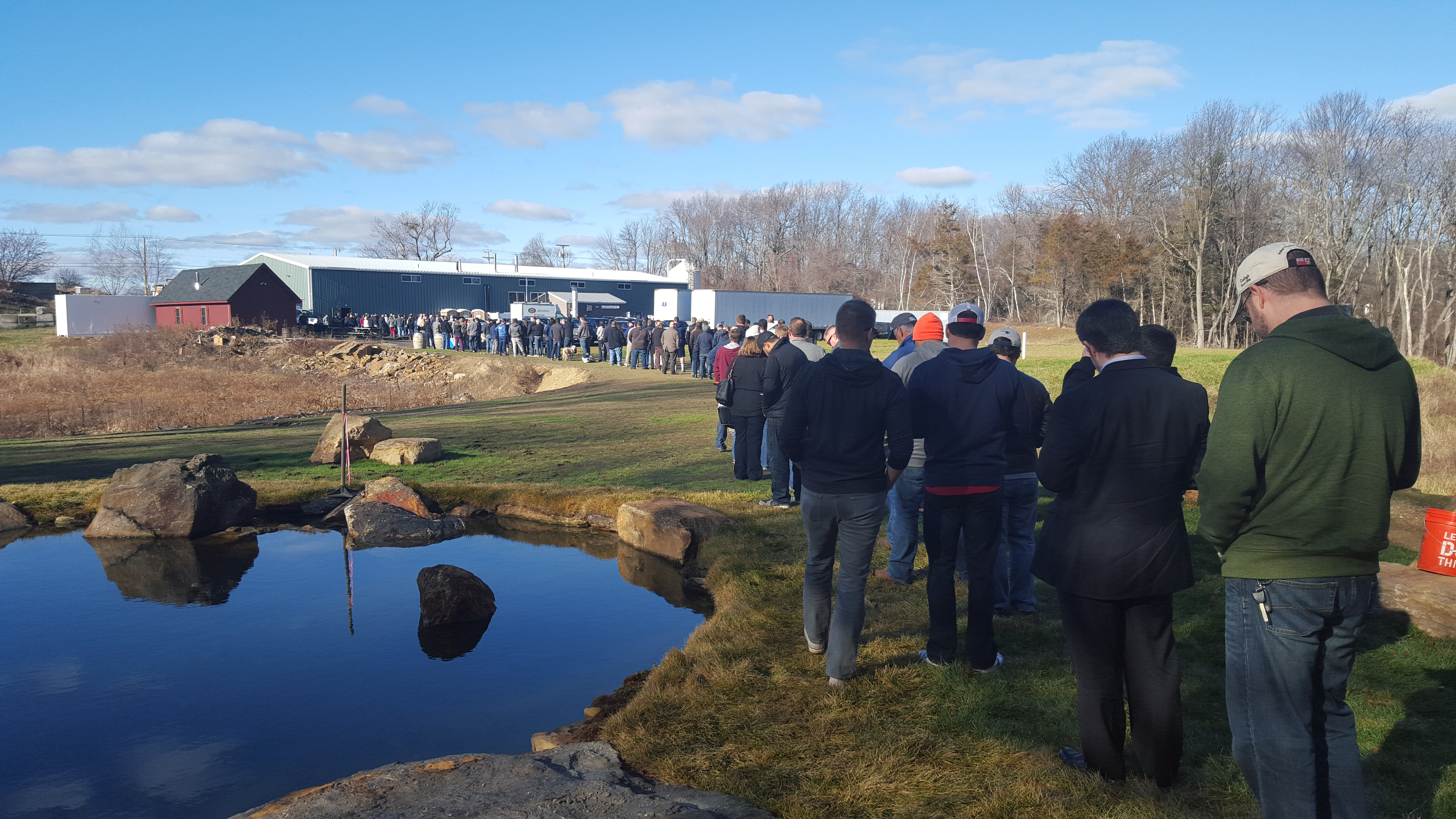 People waited in line for Tree House beers around 12:30 on Wednesday — half an hour after the brewery opened for the week. On Wednesdays, they only sell cans to go, and on that day the offerings were Green, an IPA, and Lights On, a pale ale.