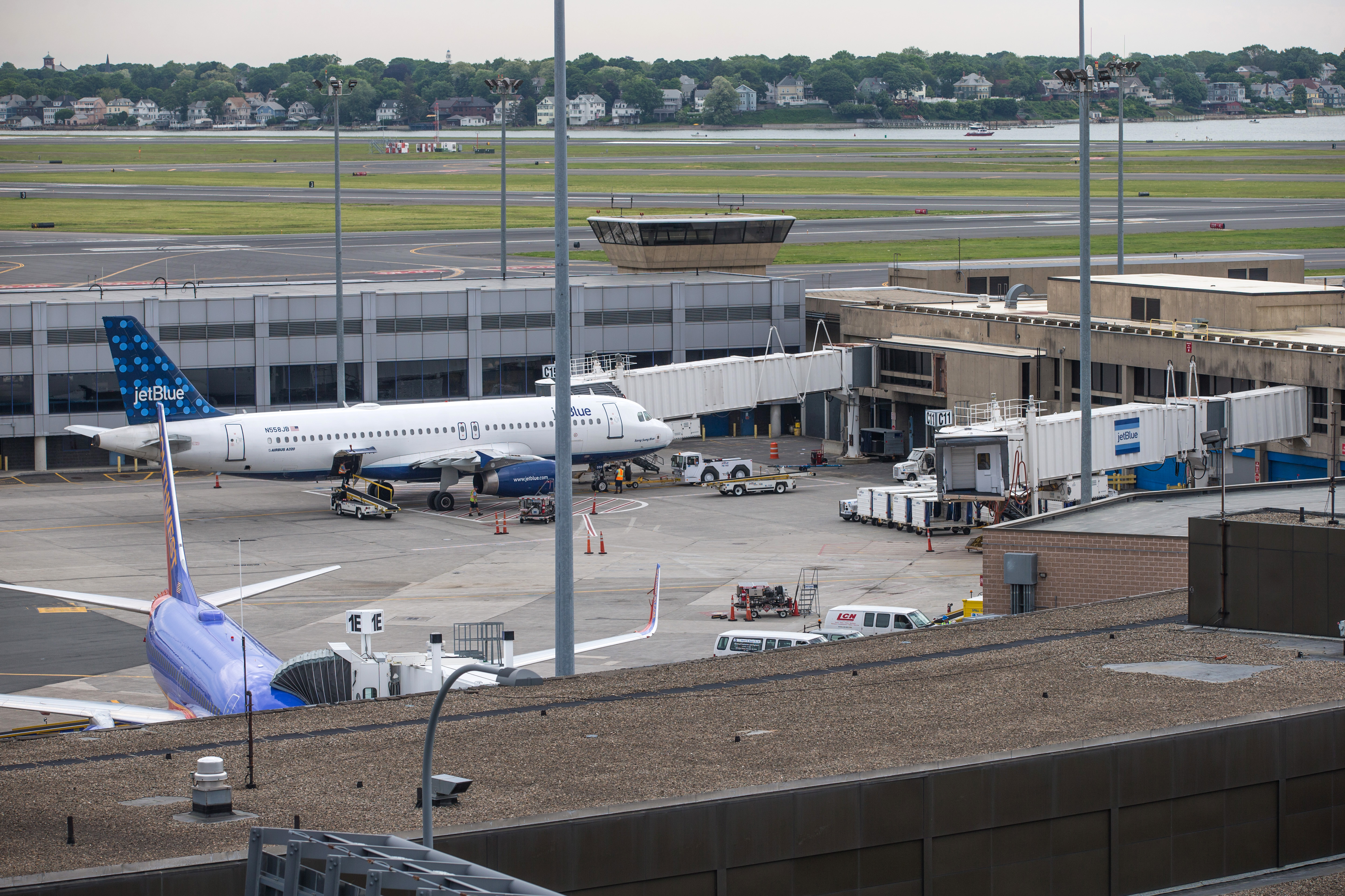The Southwest plane was being pushed back from its gate before departure to Kansas City when it collided with a JetBlue plane sittingnearby.