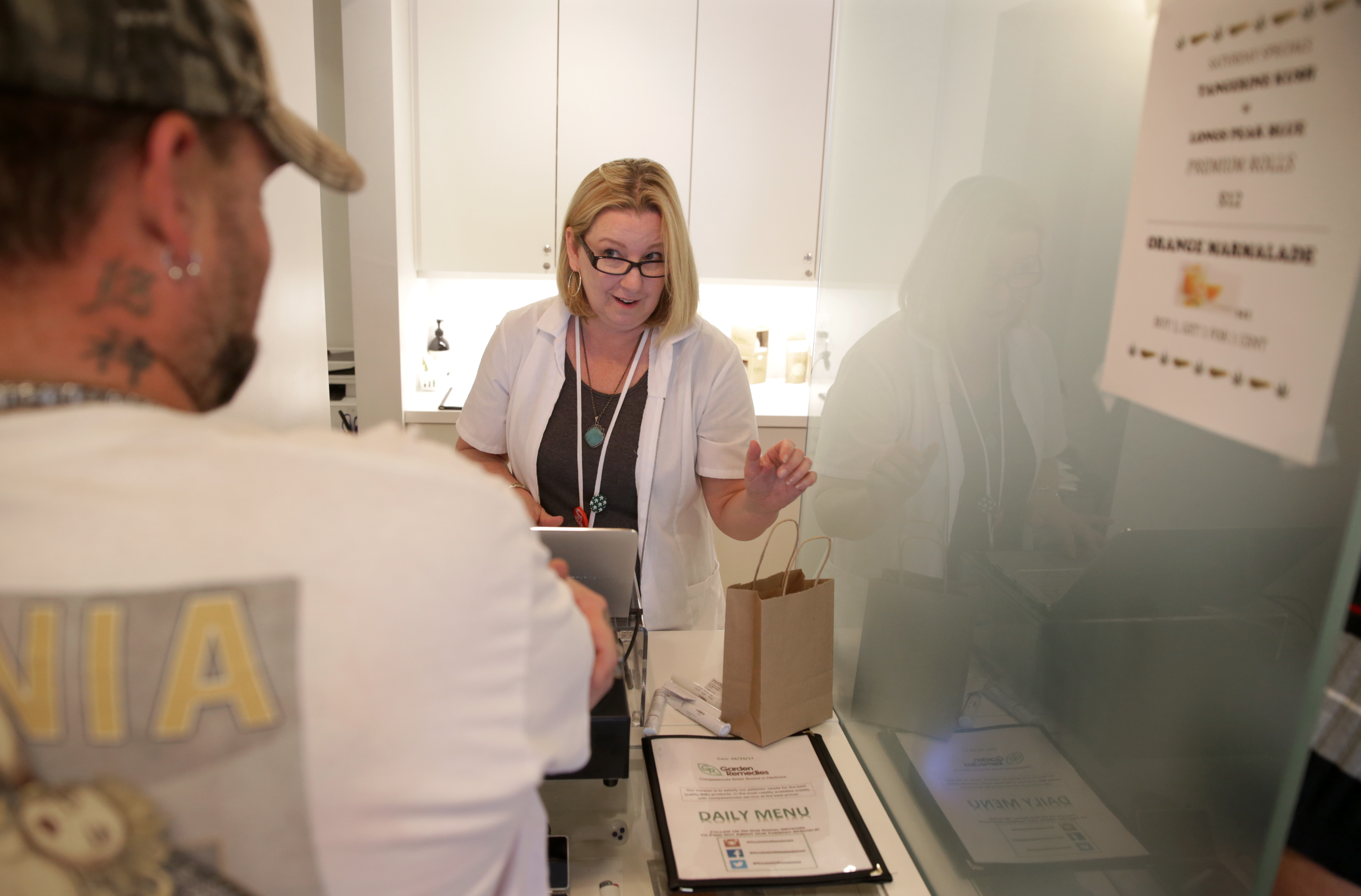 Patient care advocate Cynthia C. Mortali filled an order for a patient at the Garden Remedies facility in Newton.