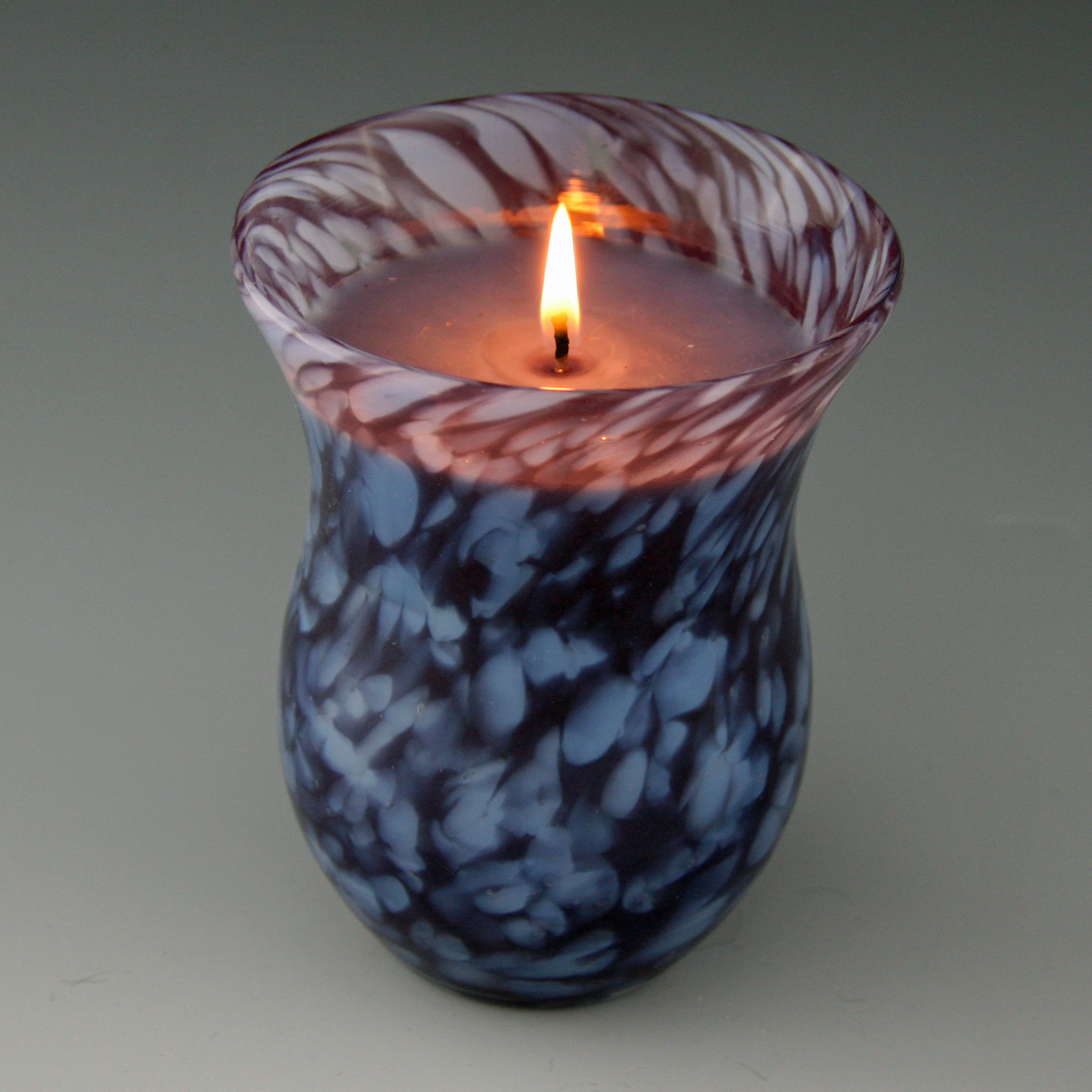 08negifts - Dana Elle Candles are poured into blown glass made by Portland Glass Blowing. (Handout)