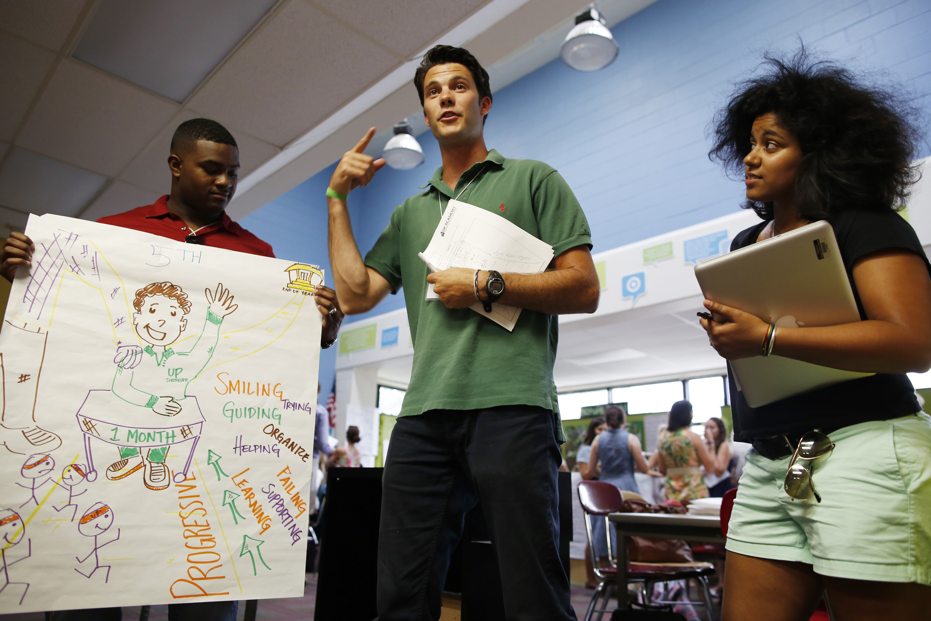 Incoming UP Academy teachers Nicholas Speller (left), Drew Gallagher, and Elena Millius took part in their first day of training.