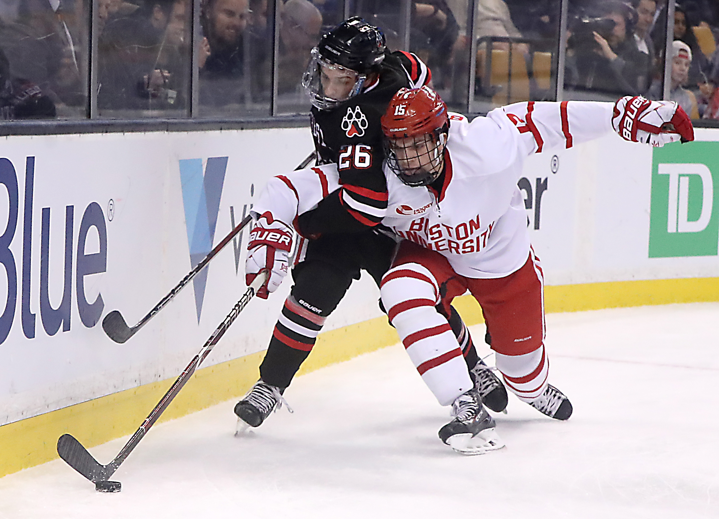 Northeastern Biagio Lerario got a defensive pressure from BU Chase Phelps during second period.