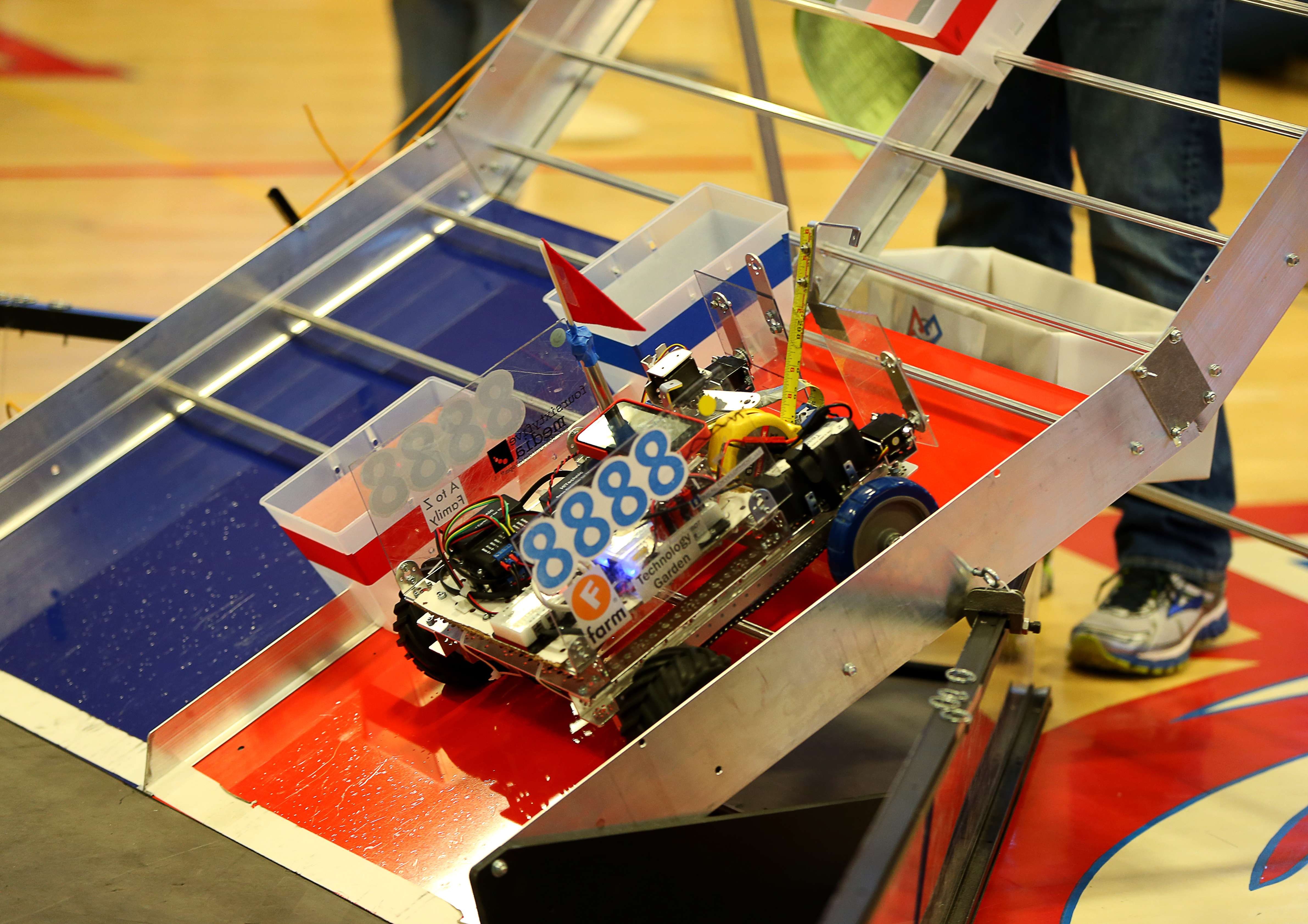 Team Infinity Factor's robot during competition at the Massachusetts First Tech Challenge State Championships at Natick High School.