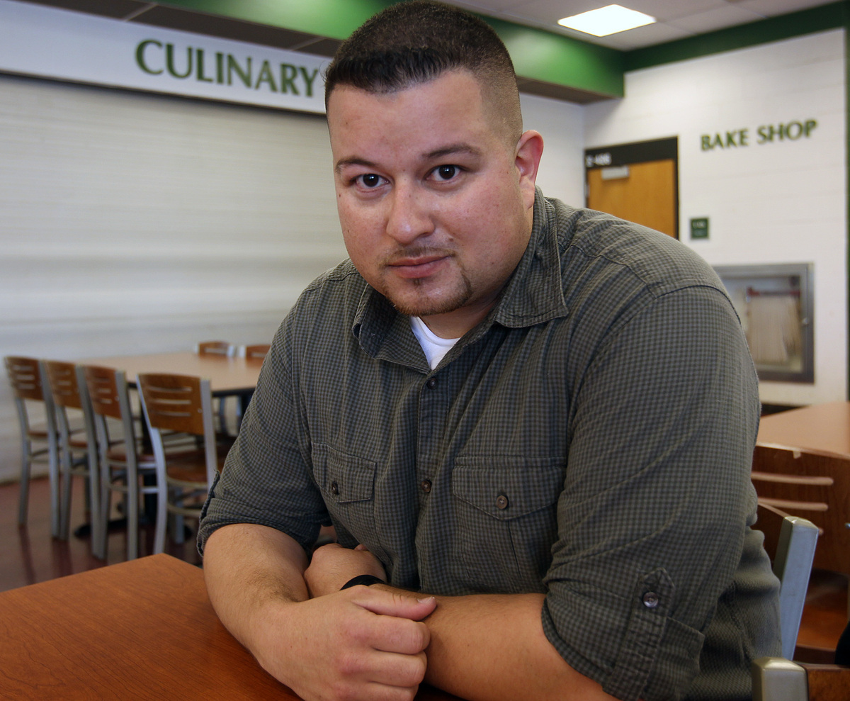 Wilfredo Melendez, a Bunker Hill Community College student and father, was among those who made use of a food bank.