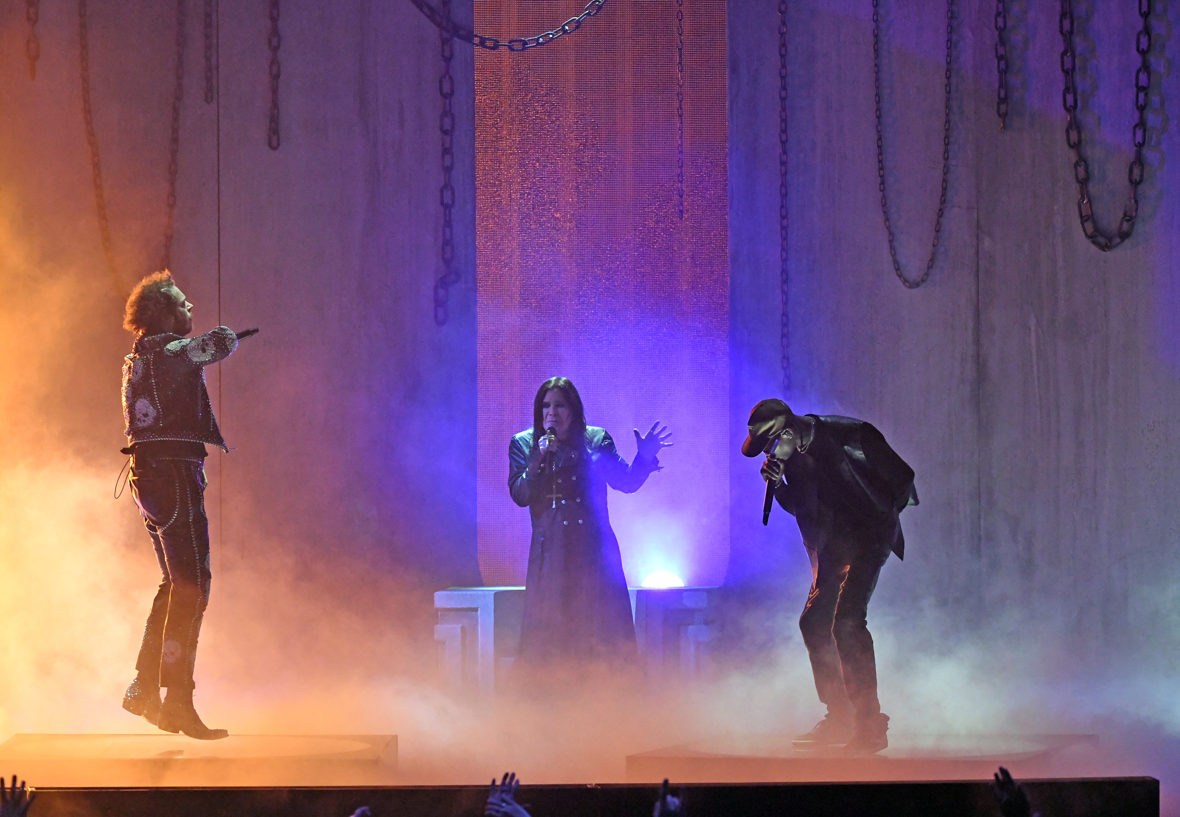 (Left to right) Post Malone, Ozzy Osbourne, and Travis Scott performed onstage during the show.