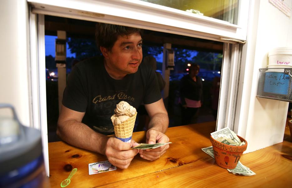 Chris Goulet waited to pay for his family’s ice cream at Flint Farm.