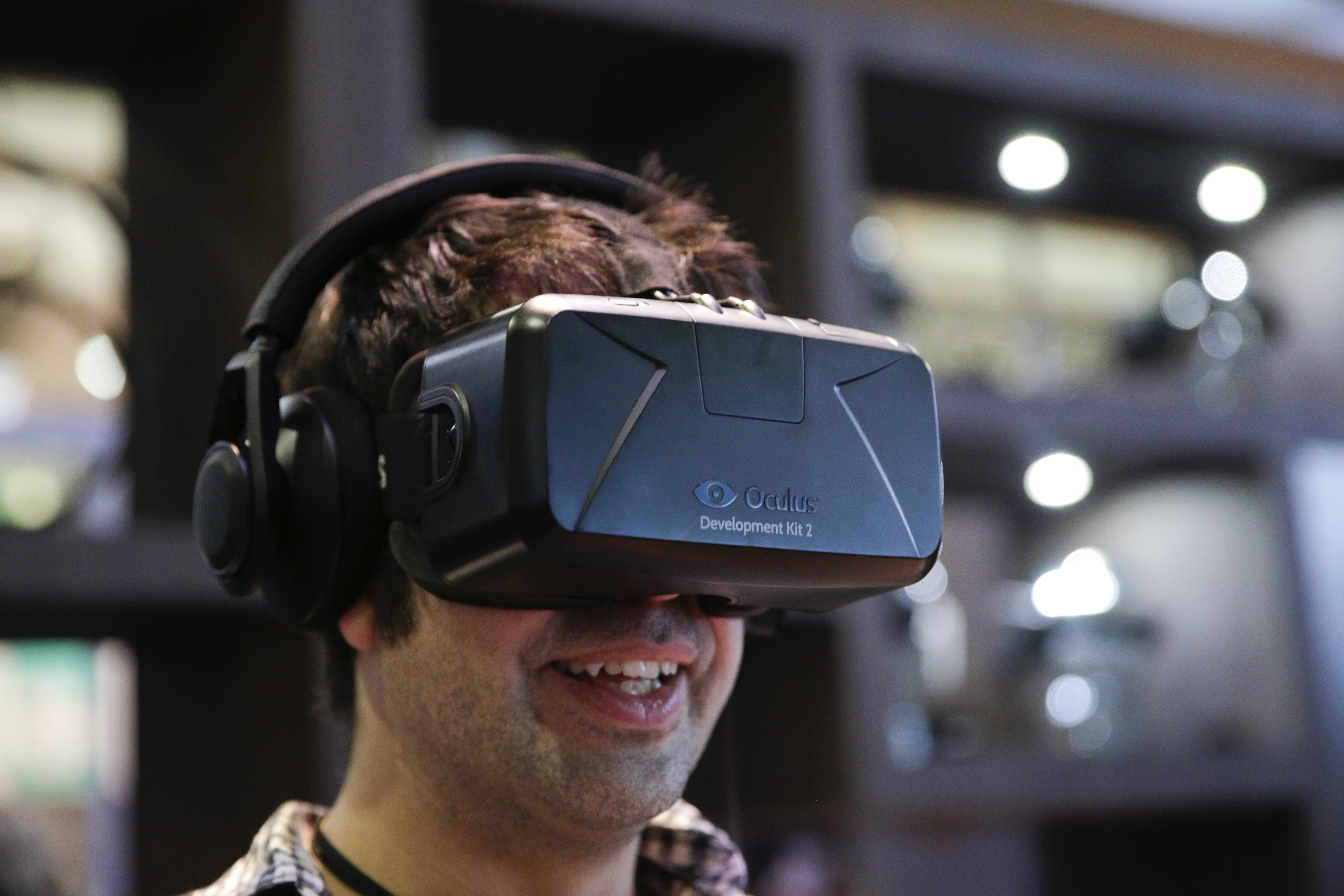 The Oculus Rift virtual reality headset is demonstrated at the Oculus booth at the Electronic Entertainment Expo in Los Angeles in 2014.