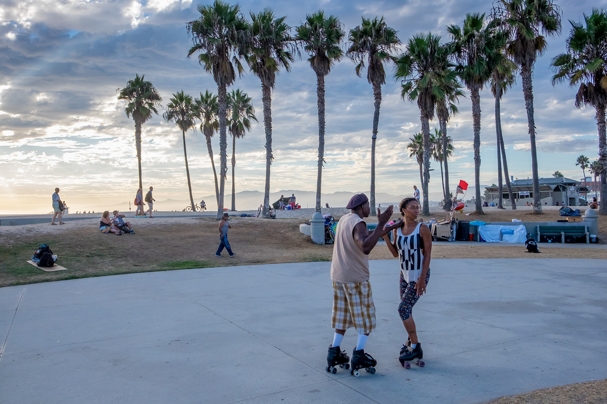 Watch the sunset (or the people) at popular Venice Beach.