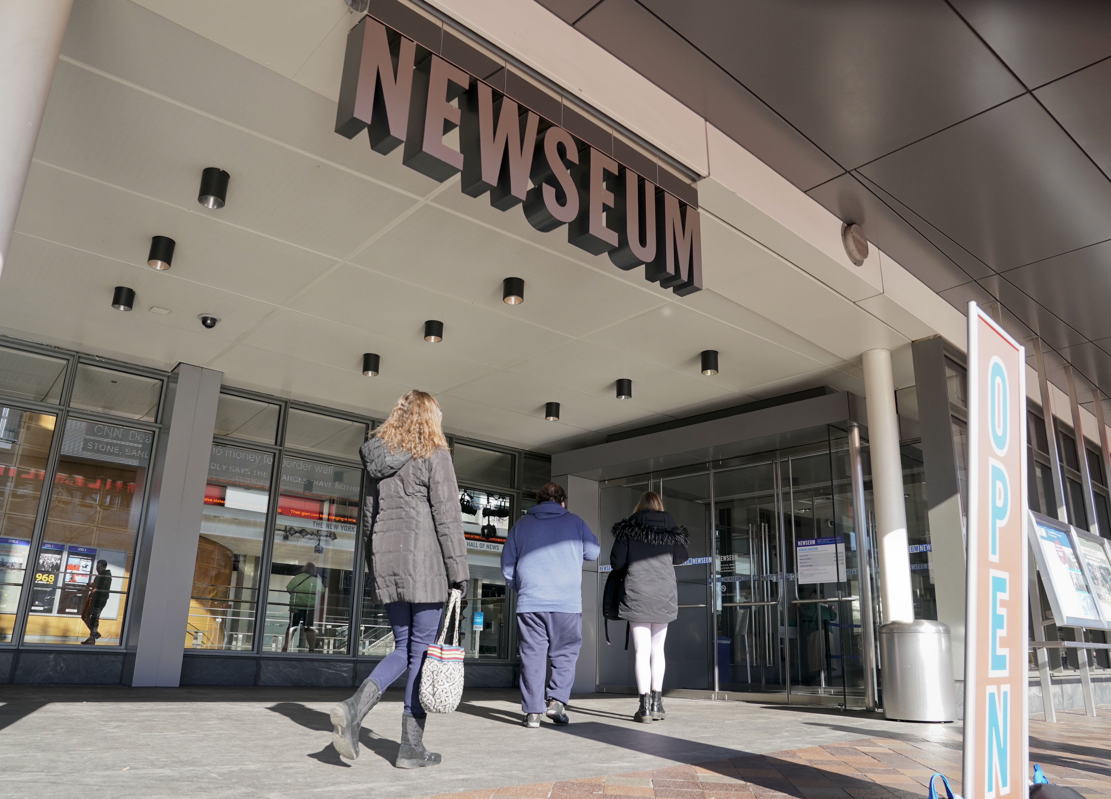 Visitors enter the Newseum, near the National Mall in Washington, Friday, Jan. 25, 2019. 
