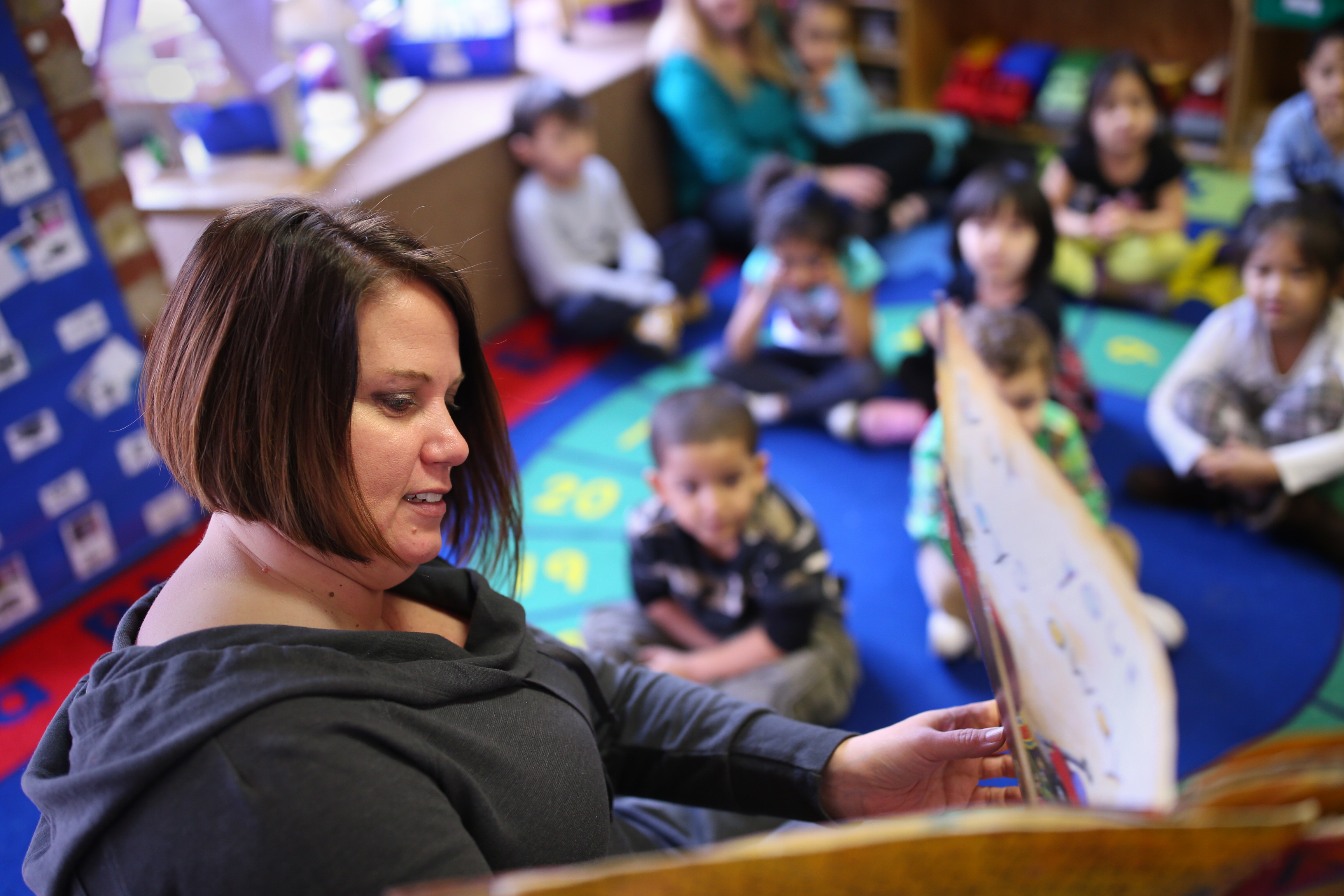 Pre-kindergarten teacher Kristin Hovey makes just $14.25 per hour, and she has to work extra jobs on nights and weekends to make ends meet.