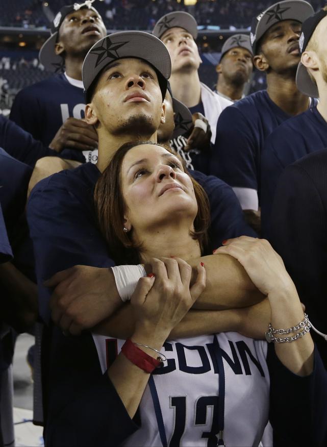 Shabazz Napier embraced his mother, Carmen Velasquez, during a celebration after winning the NCAA Final Four in Texas.