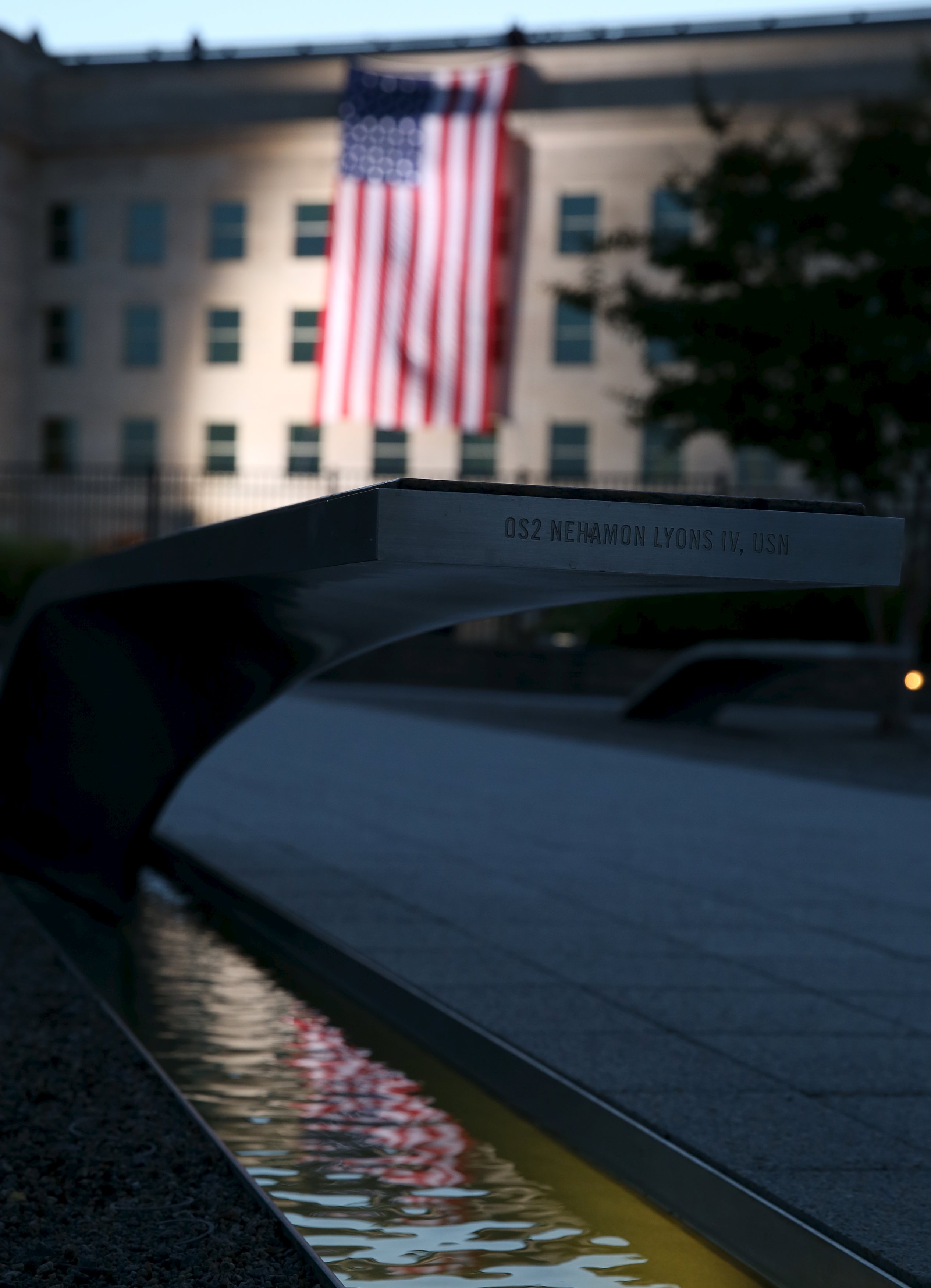 A US flag was unfurled at the 9/11 Memorial at the Pentagon.