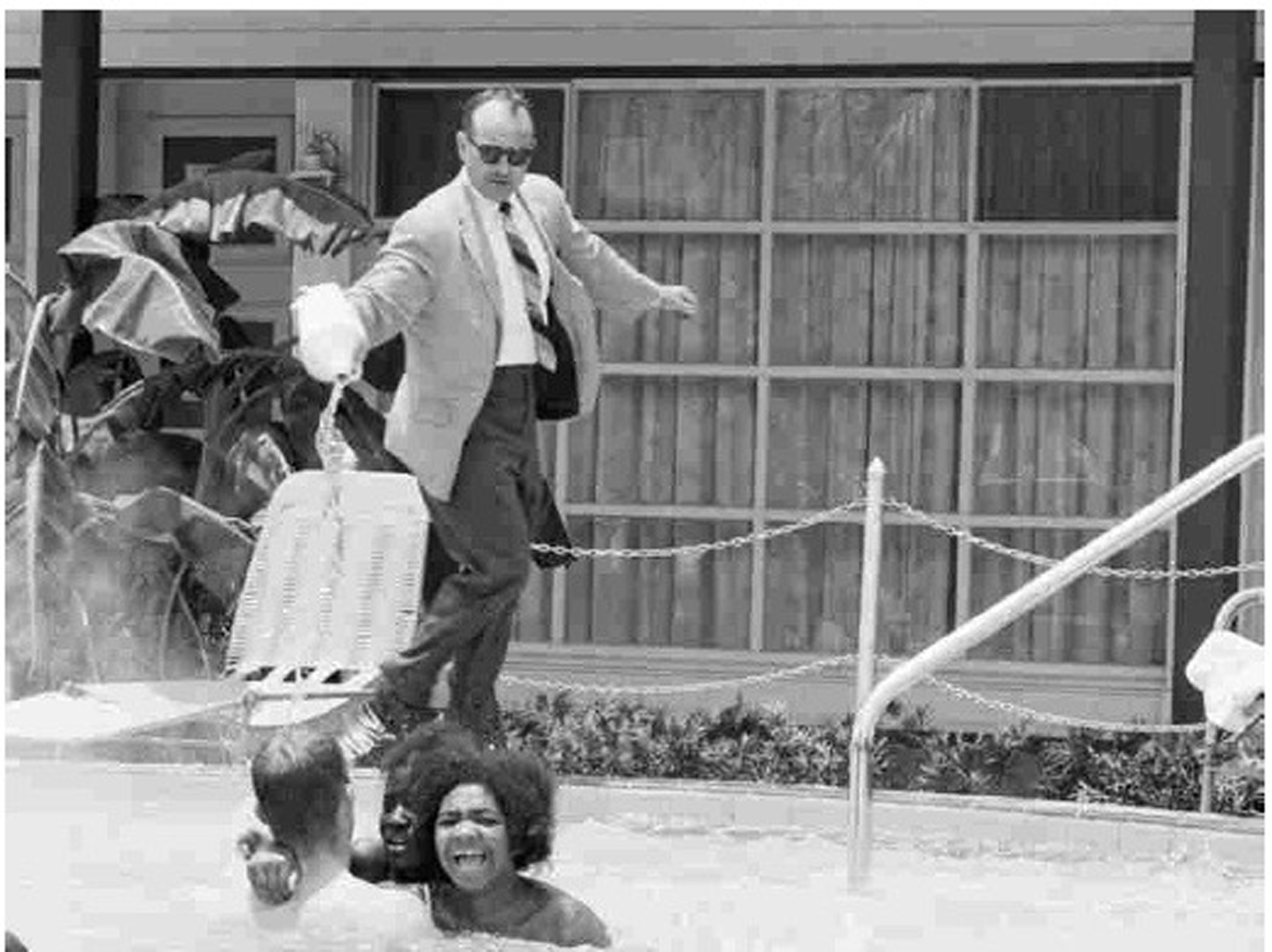 A motel owner pours acid near Mimi Jones of Roxbury during a protest at a whites-only pool in St. Augustine, as seen in the documentary “Passage at St. Augustine.”