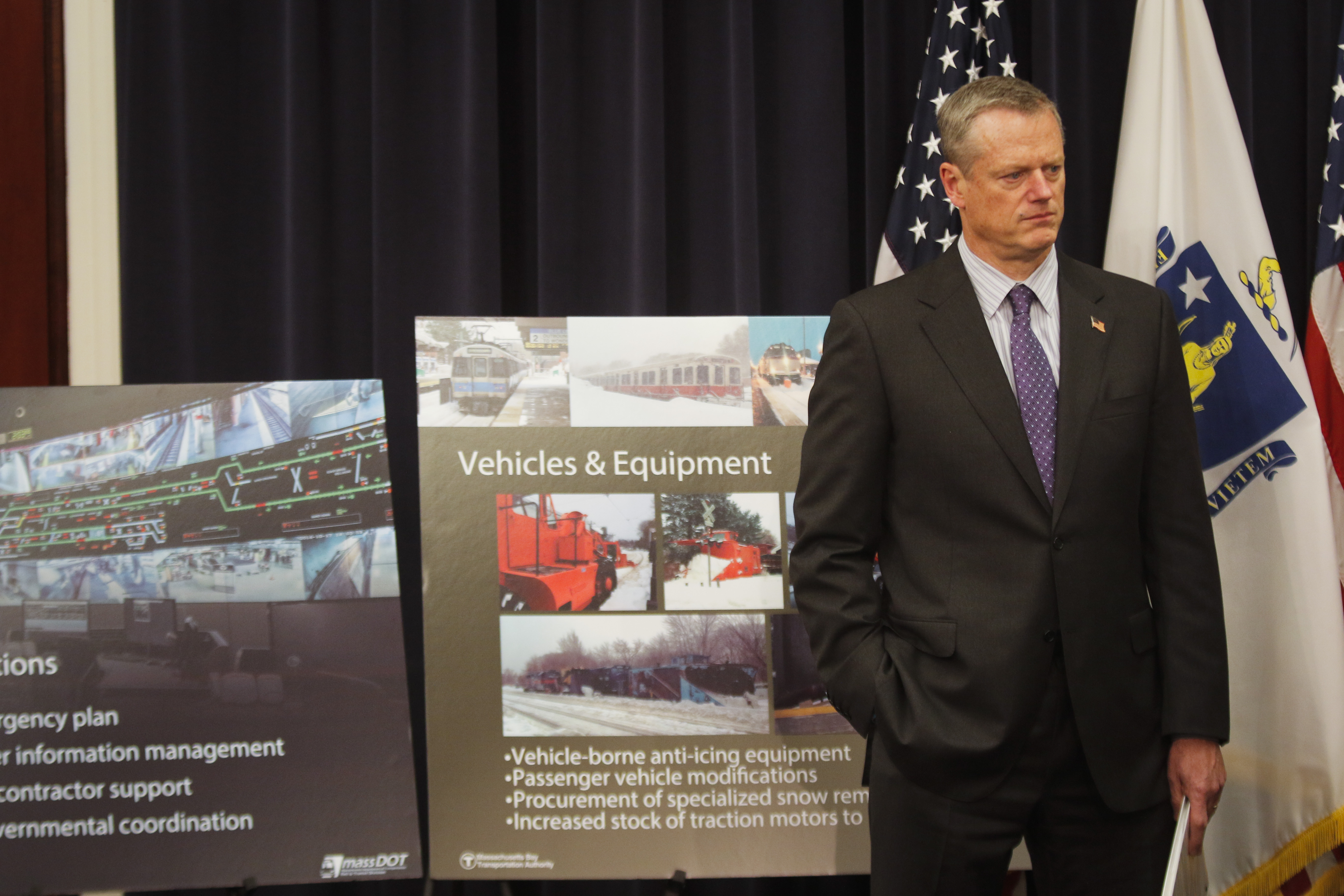 Baker listened as reporters asked questions regarding the $82.7 million MBTA Resiliency Plan that he announced in June.