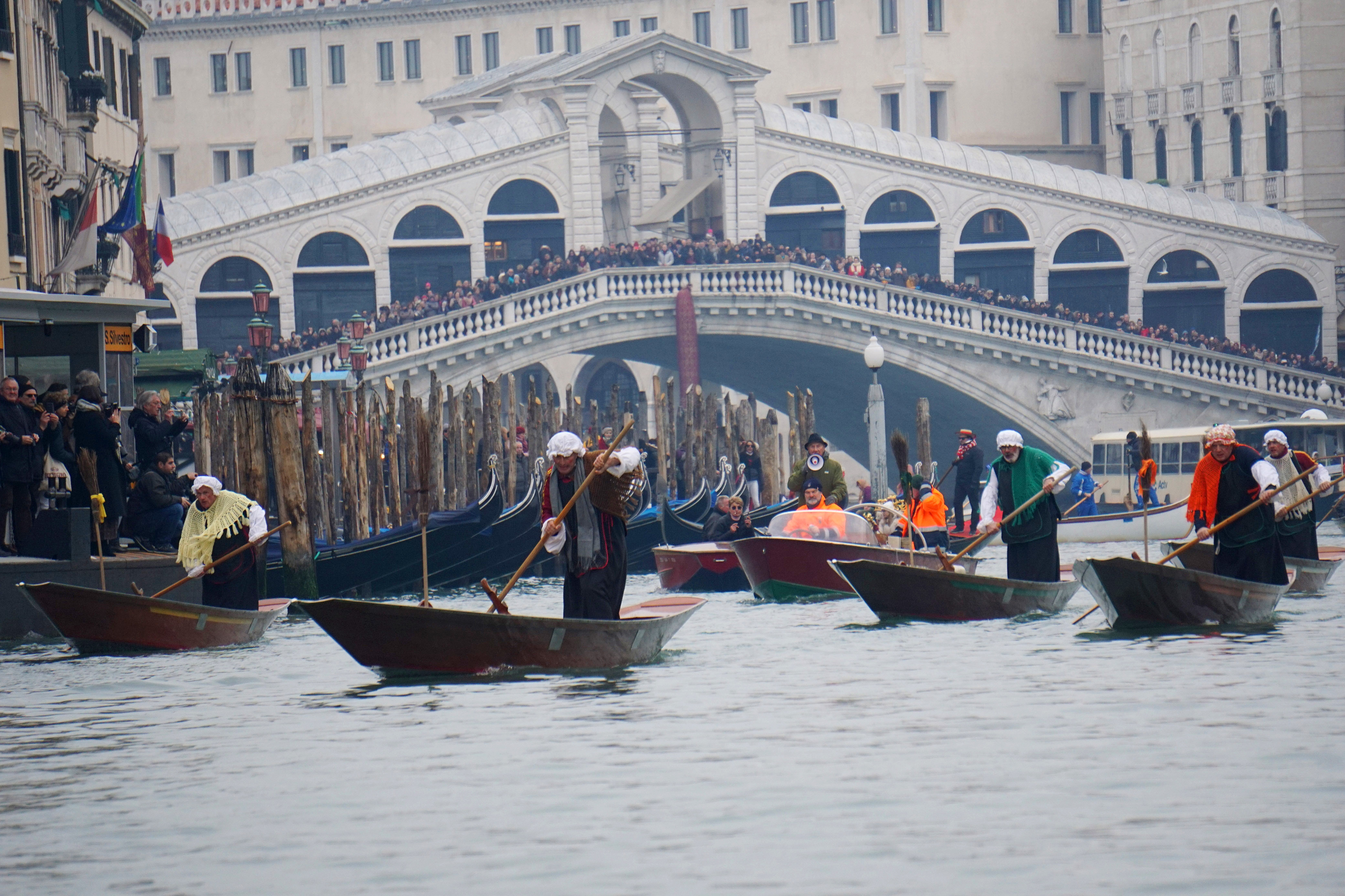 Crowds assembled near the Grand Canal in Venice to watch the traiditonal Epiphany regatta.