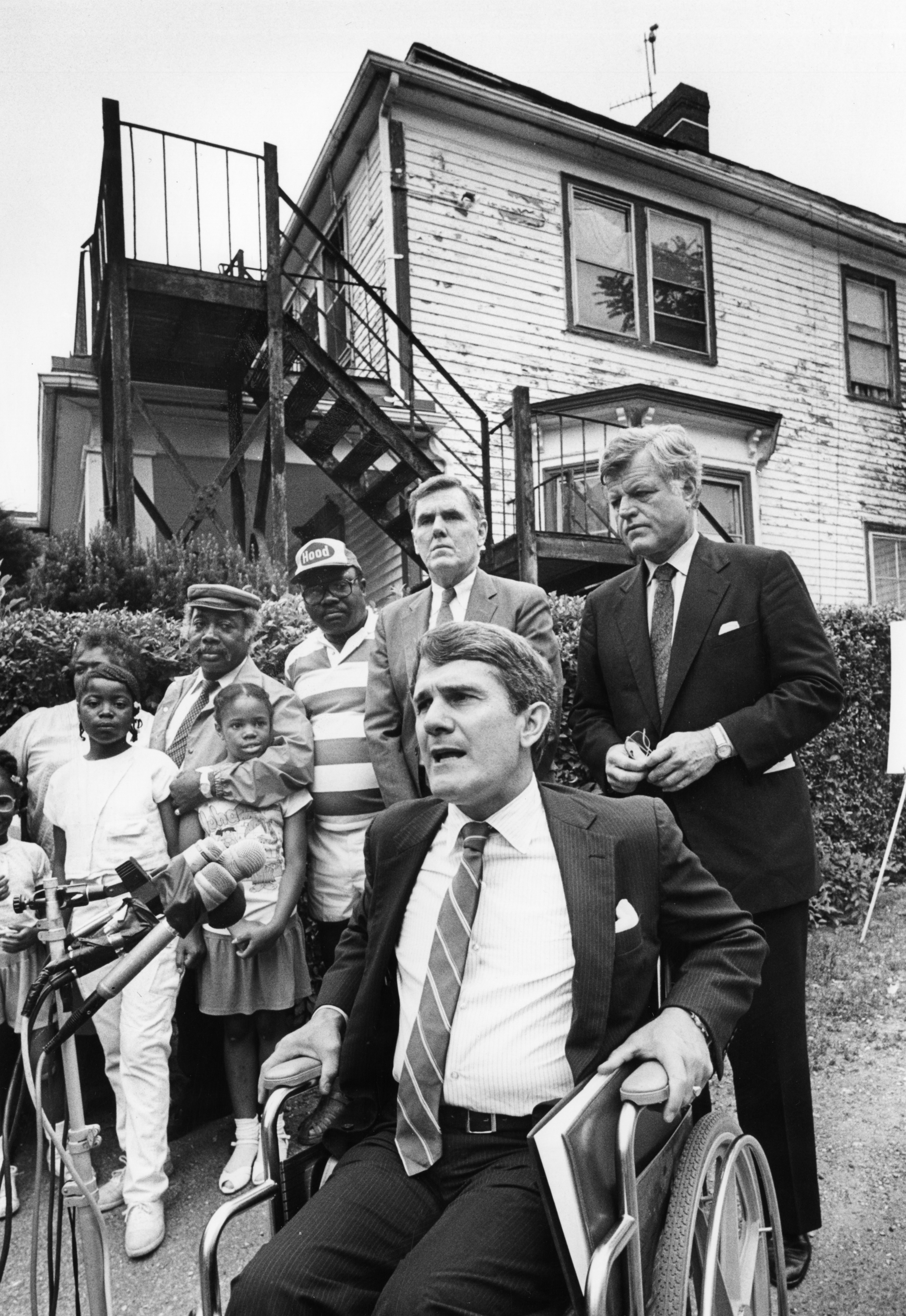Deland spoke during the announcement of an E.P.A. soil cleanup program outside the home of the Jones family in Dorchester. Deland was joined by US Senator Ted Kennedy, right, Boston Mayor Ray Flynn, standing center, and members of the Jones family, standing left.
