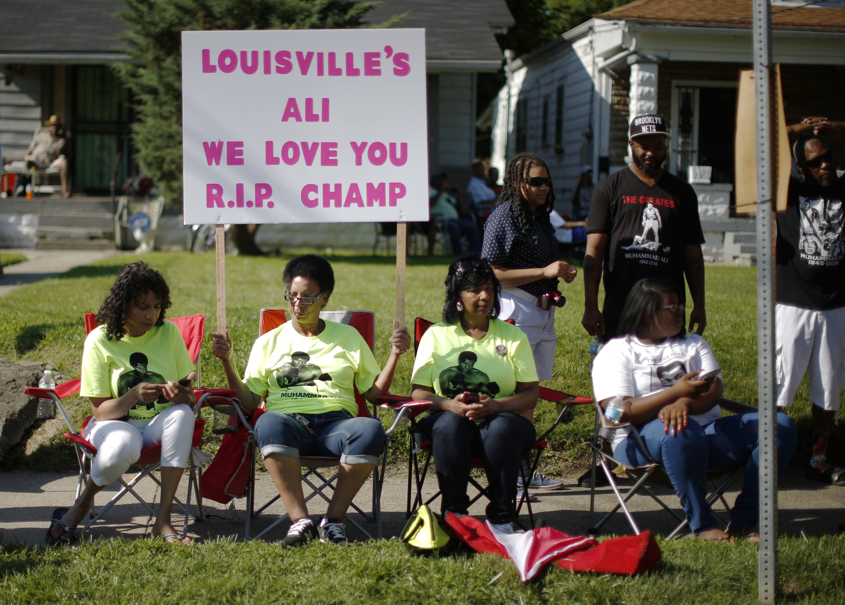 Mourners gathered along the procession route Friday.