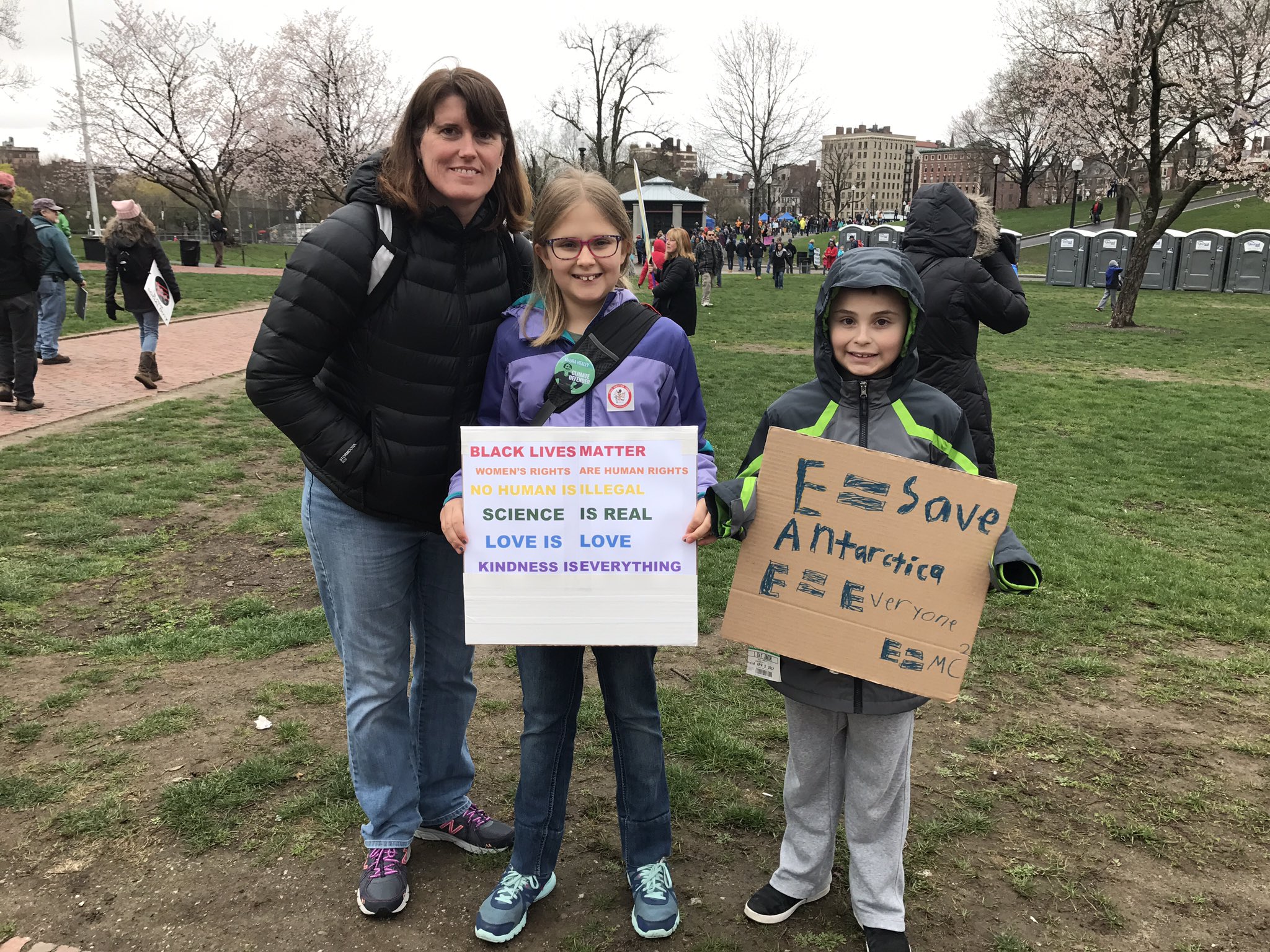 Ten-year-old twins Andrew and Kierra held signs at the March for Science in Boston