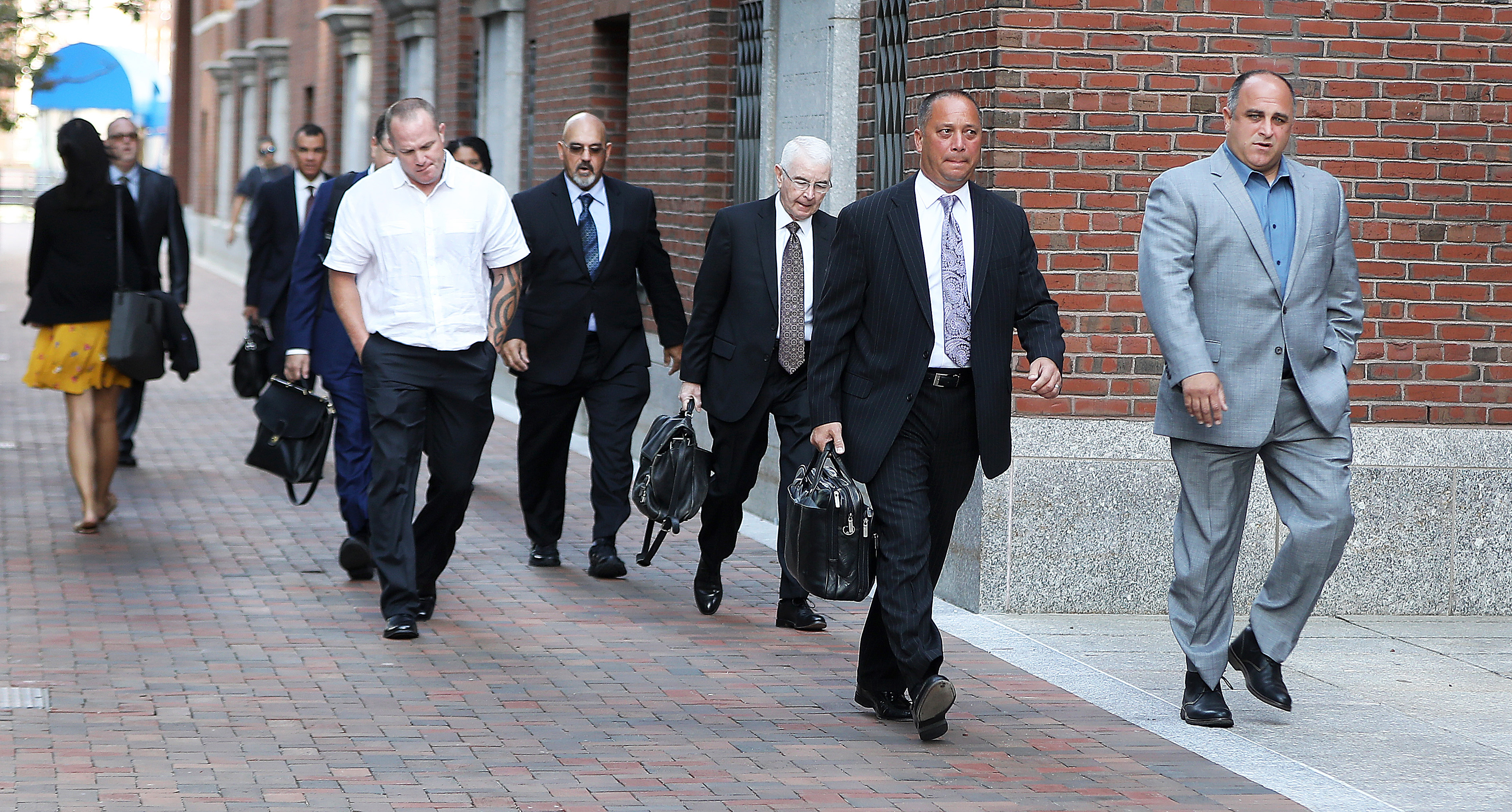 Robert Cafarelli (right) and his lawyer Carmine Lepore led other defendants and attorneys to the courthouse.