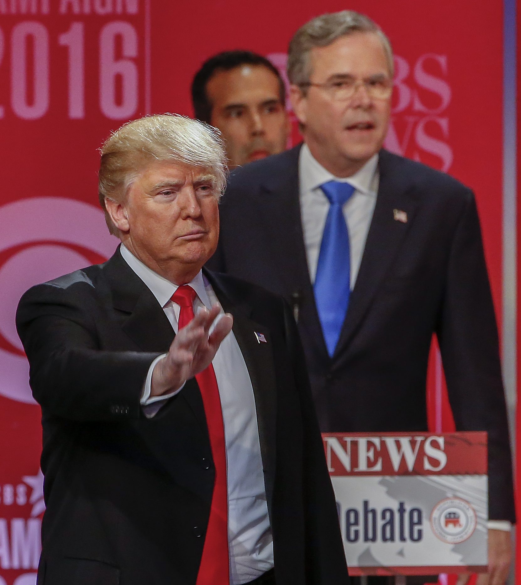 Donald Trump and Jeb Bush (seen after the GOP debate Saturday) fought vigorously over the presidency of Jeb’s brother George, who remains very popular in South Carolina.