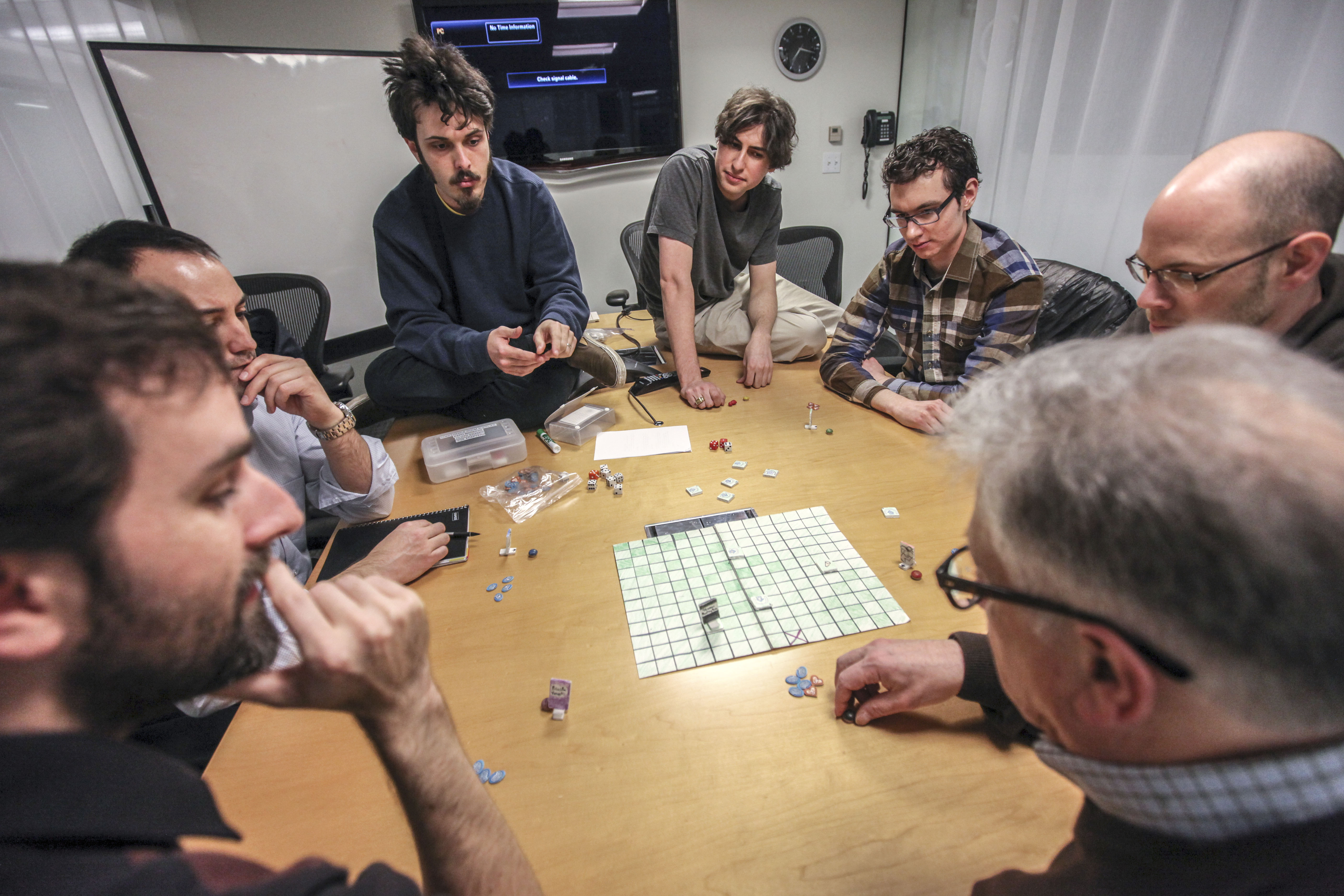 "Killer Croquet" is play-tested during a board game design and prototype circle held at the Cambridge Innovation Center.
