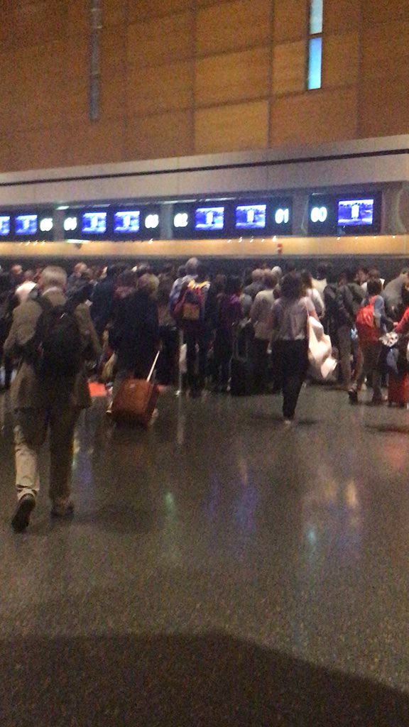 Passengers waited for more information inside Logan Airport early Wednesday after the emergency landing.