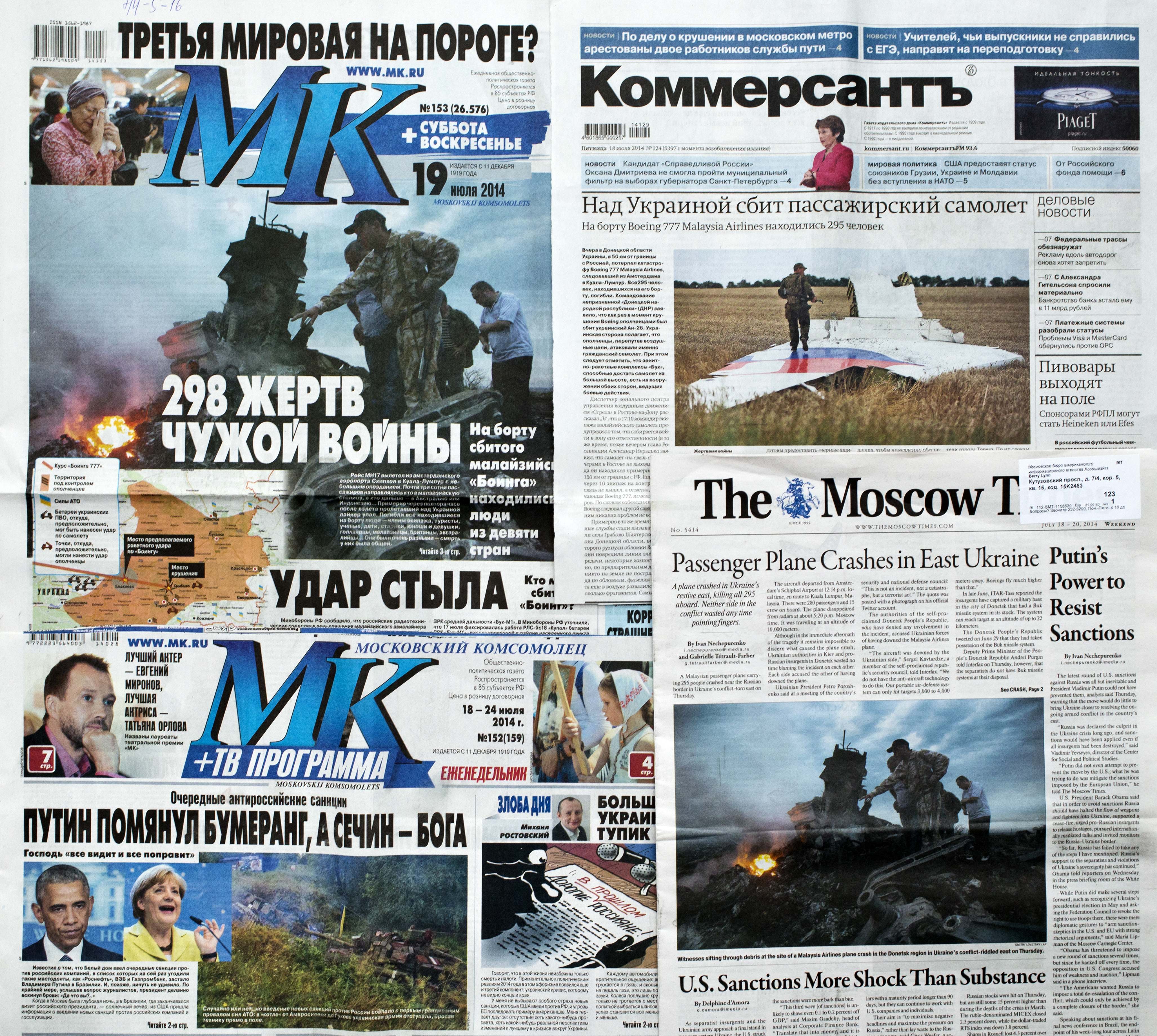 Stories in Russian publications on the Flight 17 crash bear headlines about “298 Victims of Someone Else’s War,” “Kick From Behind,” and an alleged assassination attempt against Putin.