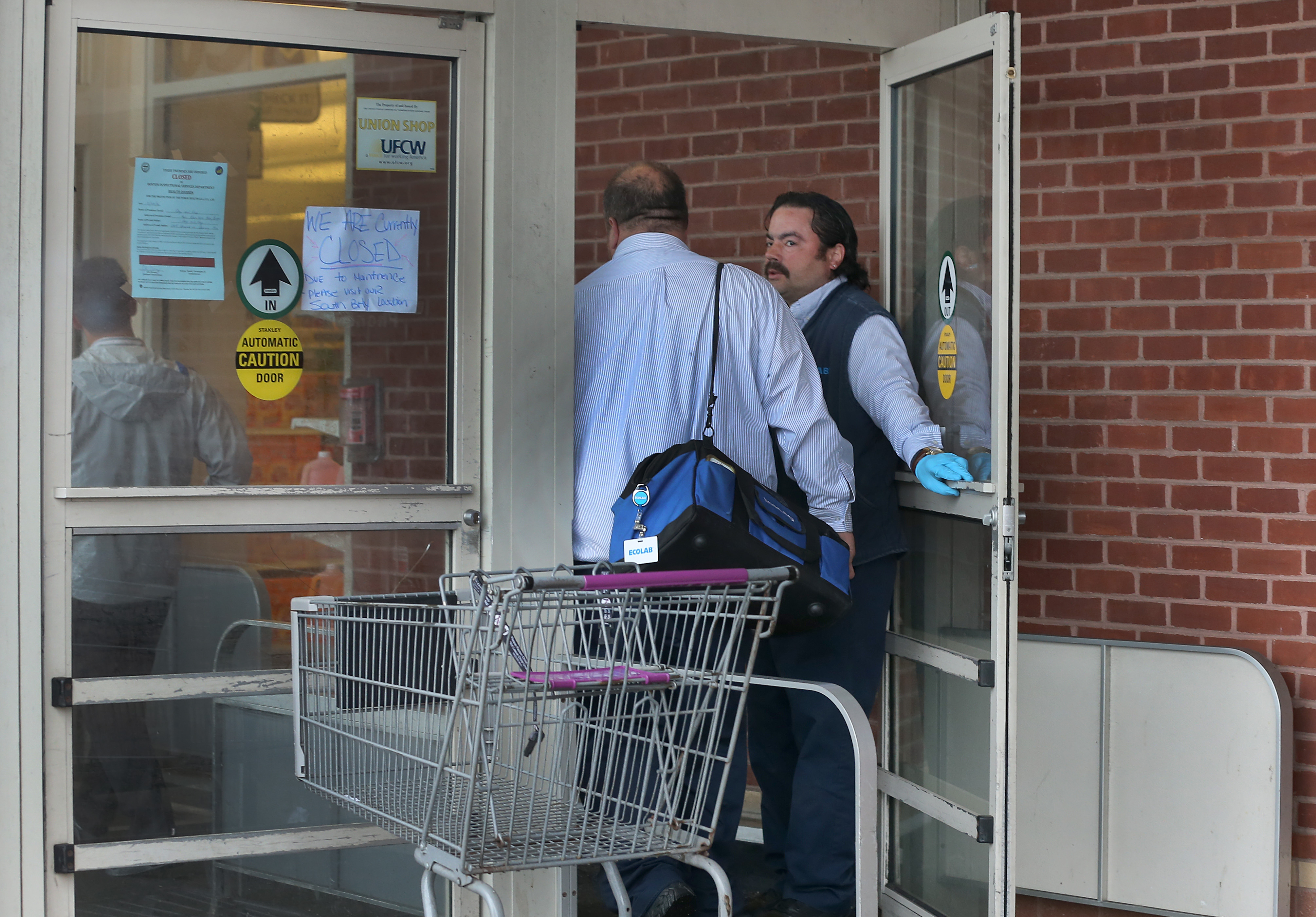 Employees from ECOLAB were let in through the front door of the Blue Hill Avenue Stop & Shop.