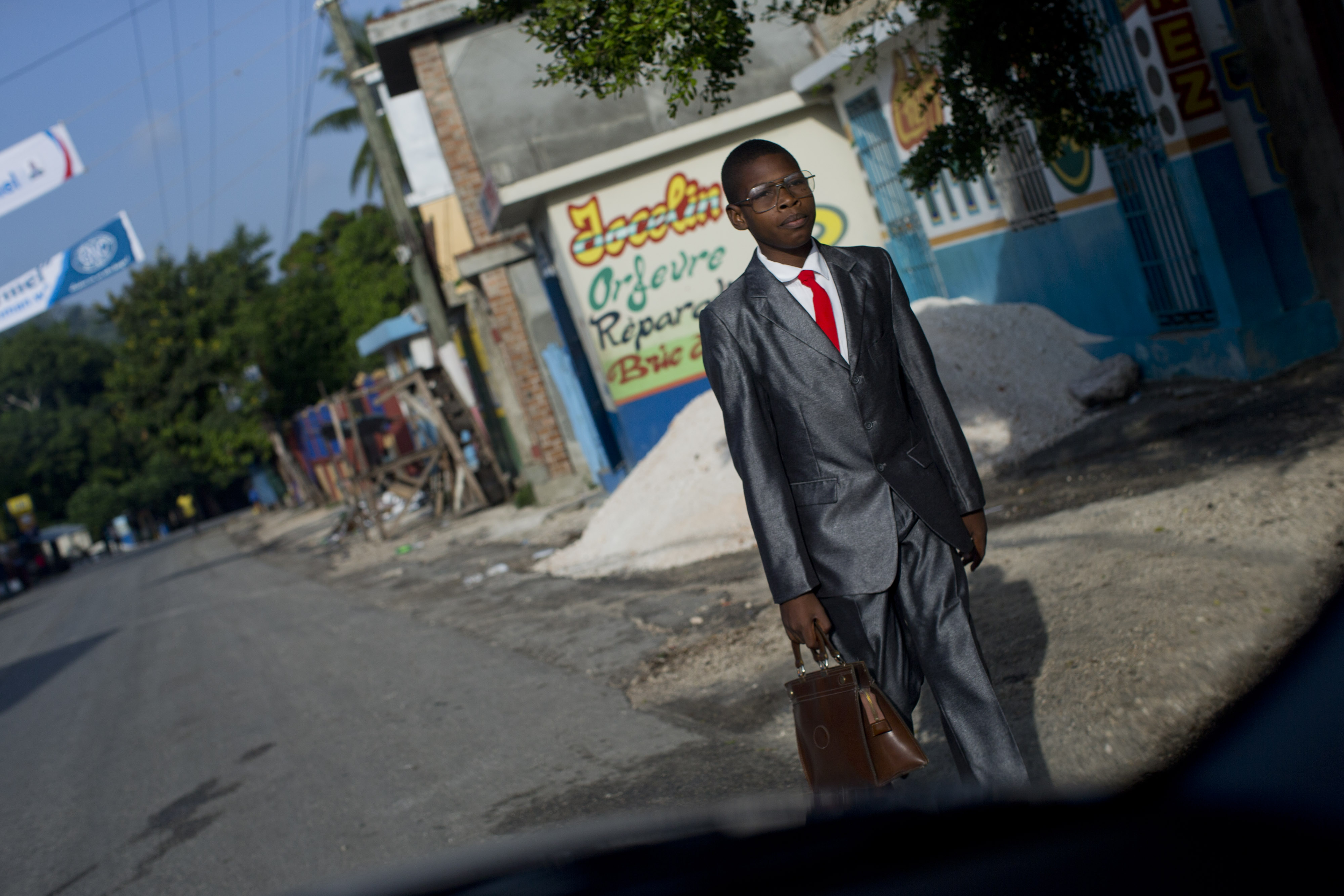 A boy made his way to school exams in Les Cayes, Haiti.