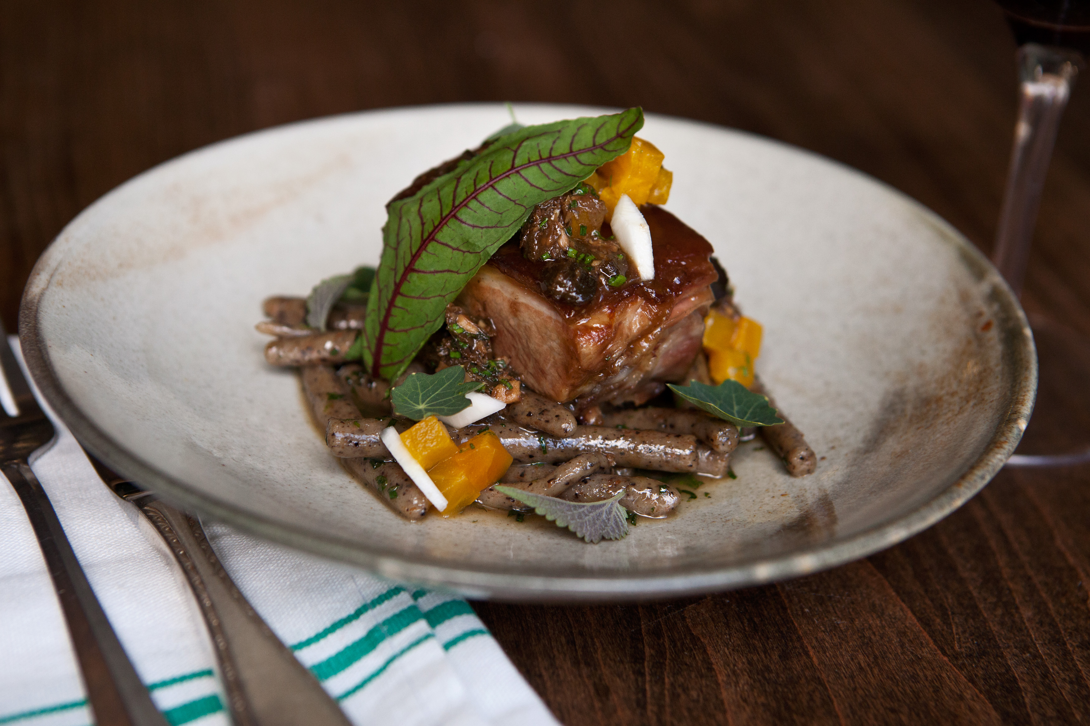 The pork with triticale macaroni and anchovy is served as an entree at Loyal Nine restaurant in Cambridge.