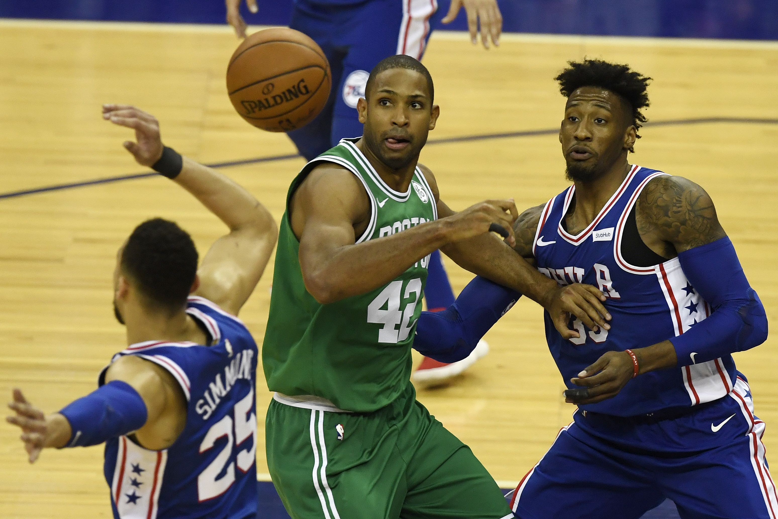 Al Horford competes for the ball against Langston Galloway. Horford finished with 13 points, 8 rebounds and 7 assists.
