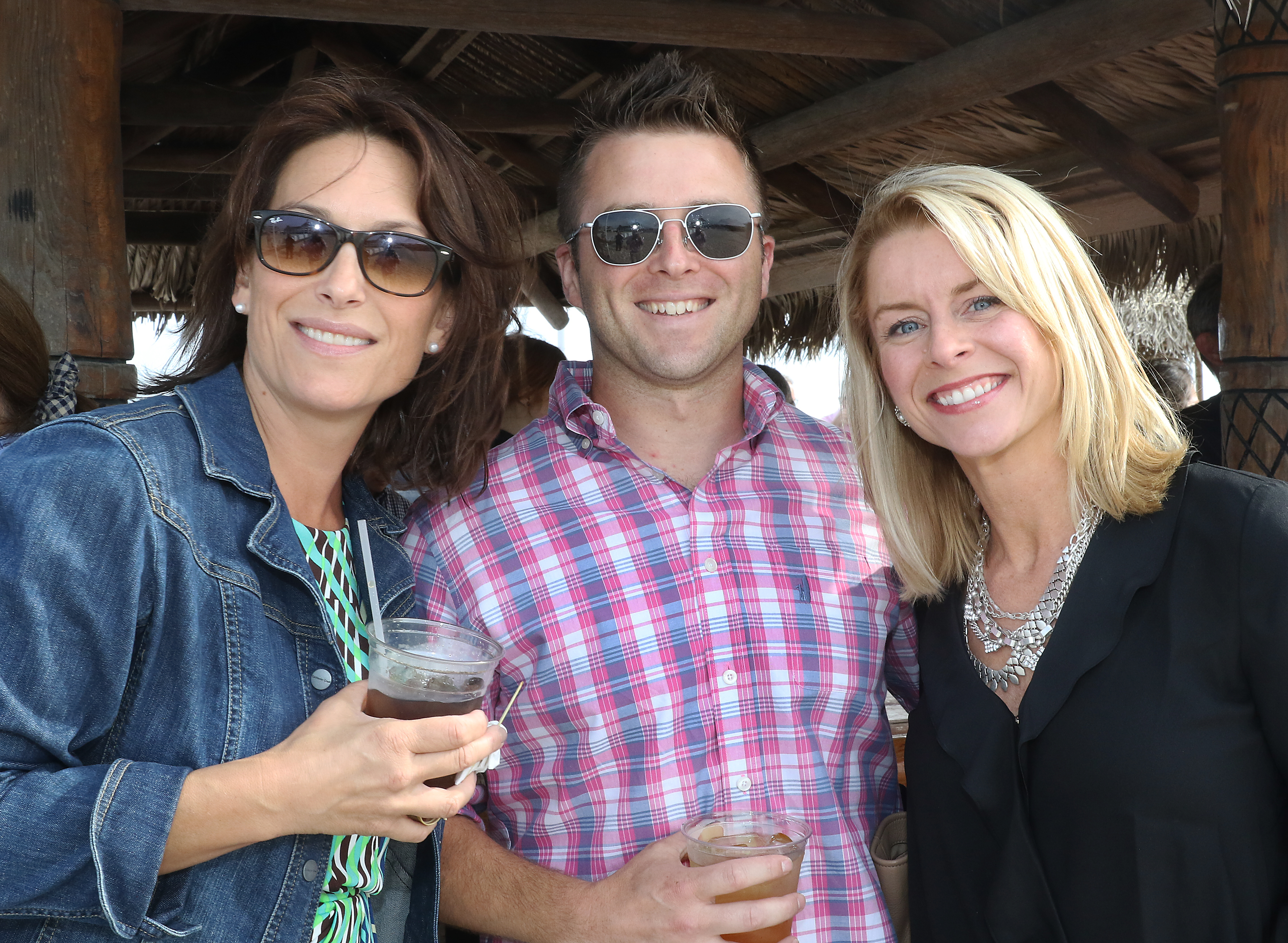 Hadley Luddy, executive director of Big Brothers Big Sisters of Cape Cod & the Islands, and Andrew and Angela Philbrook of Yarmouth Port.