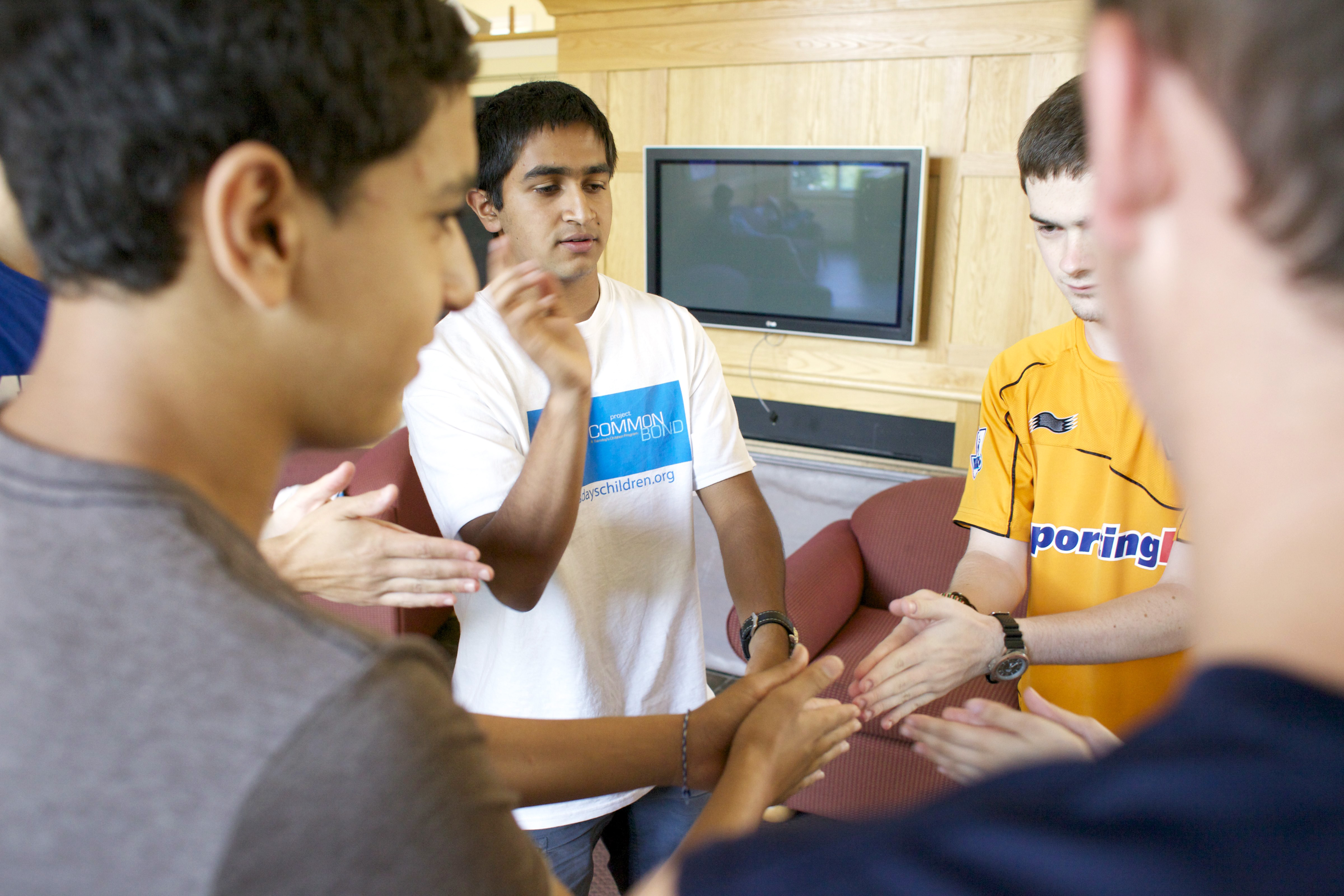 Palestinian Isaac Saleem (left), Robert Mathai of Arlington (center), and Aiden Skelton, 19, of Ireland.