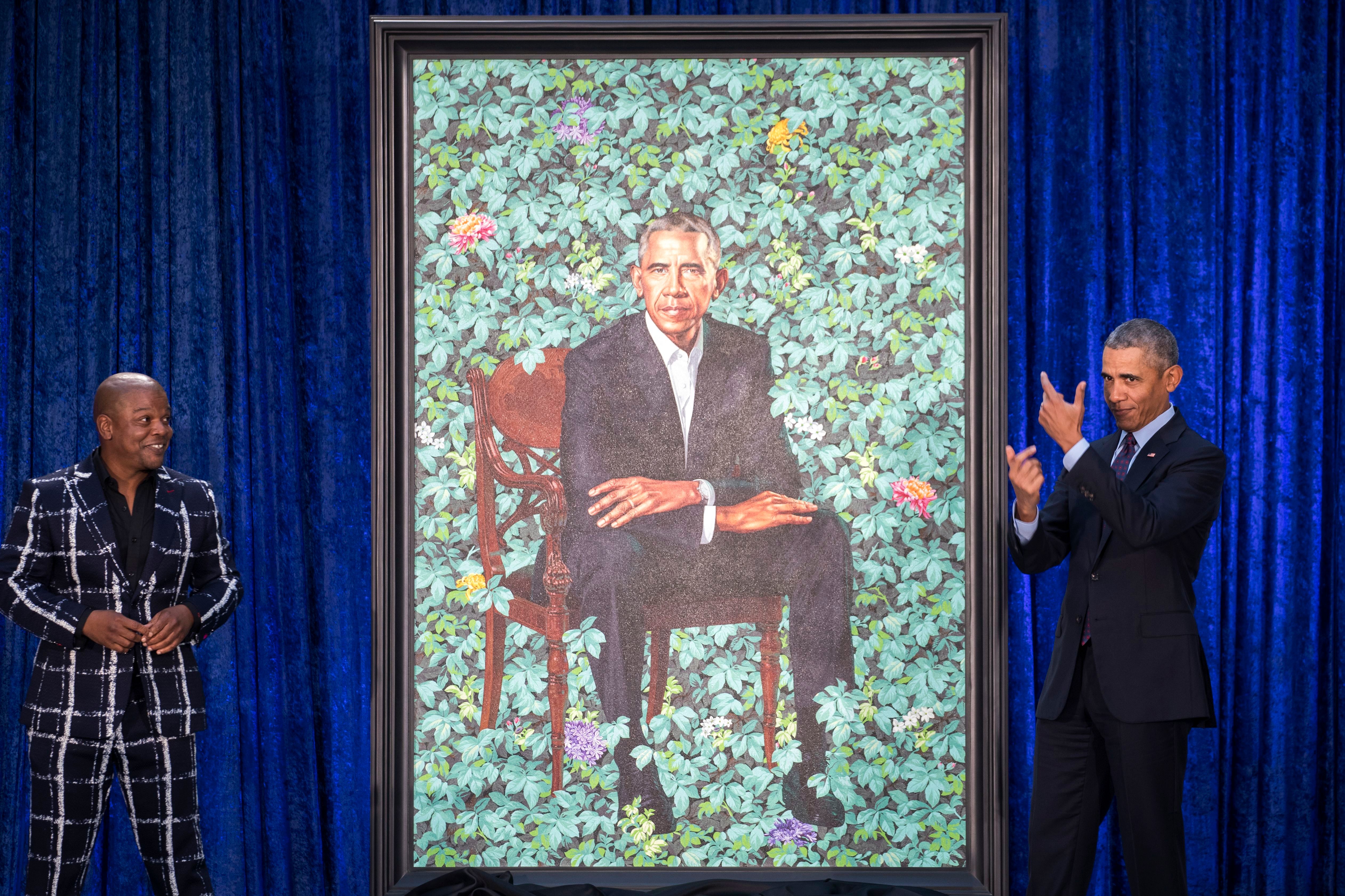 Artist Kehinde Wiley (left) and former president Barack Obama at the unveiling.